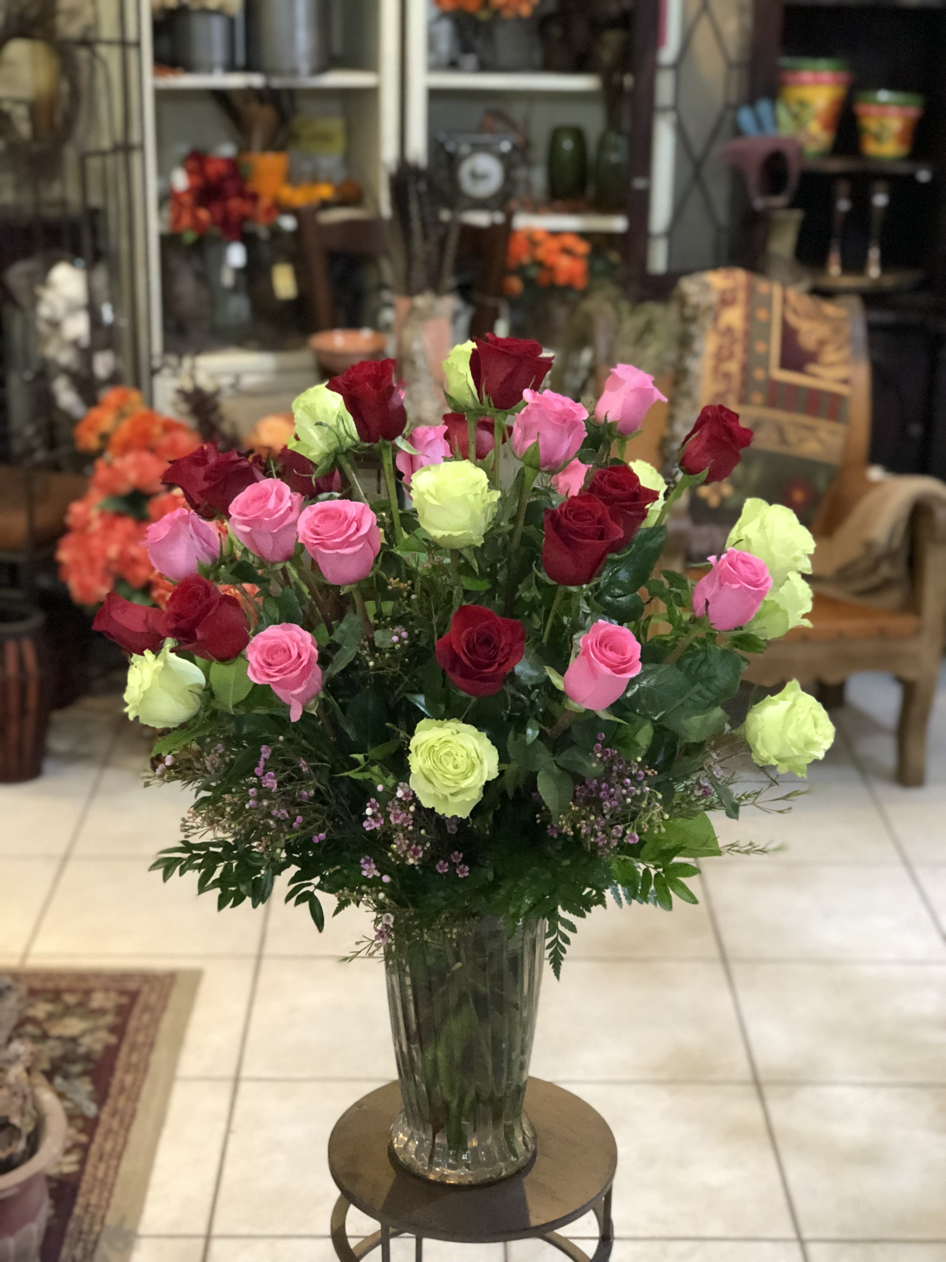 Symphony of Roses - The gorgeous arrangement of 3 dozen premium roses in 3 beautiful colors, is guaranteed to put a smile on any face!  Colors will be based on availability.