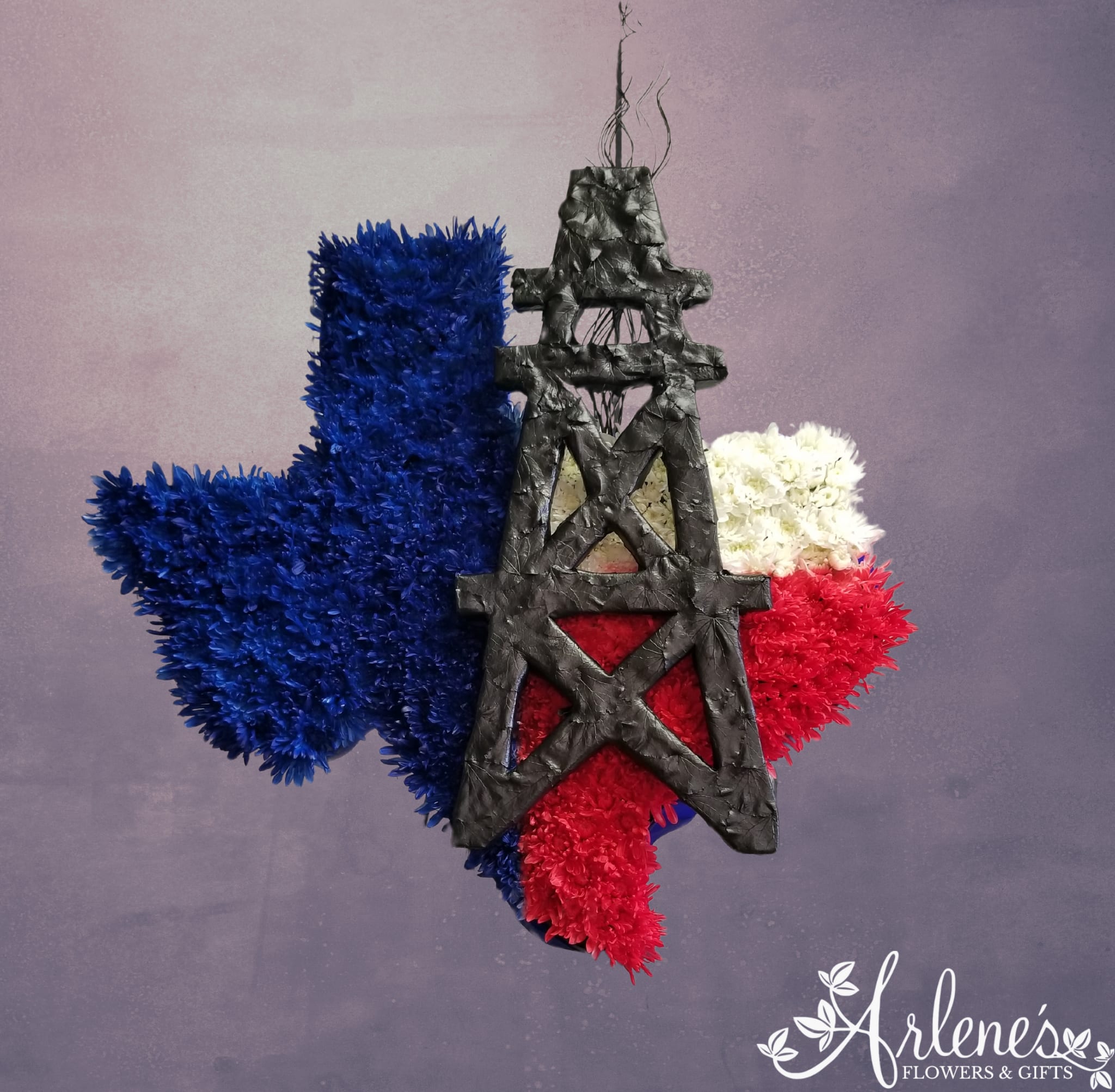 Texas Oil Texas Oil - Tribute to the long hard hours in the oilfield. Cushion poms are used to design this Texas spray.