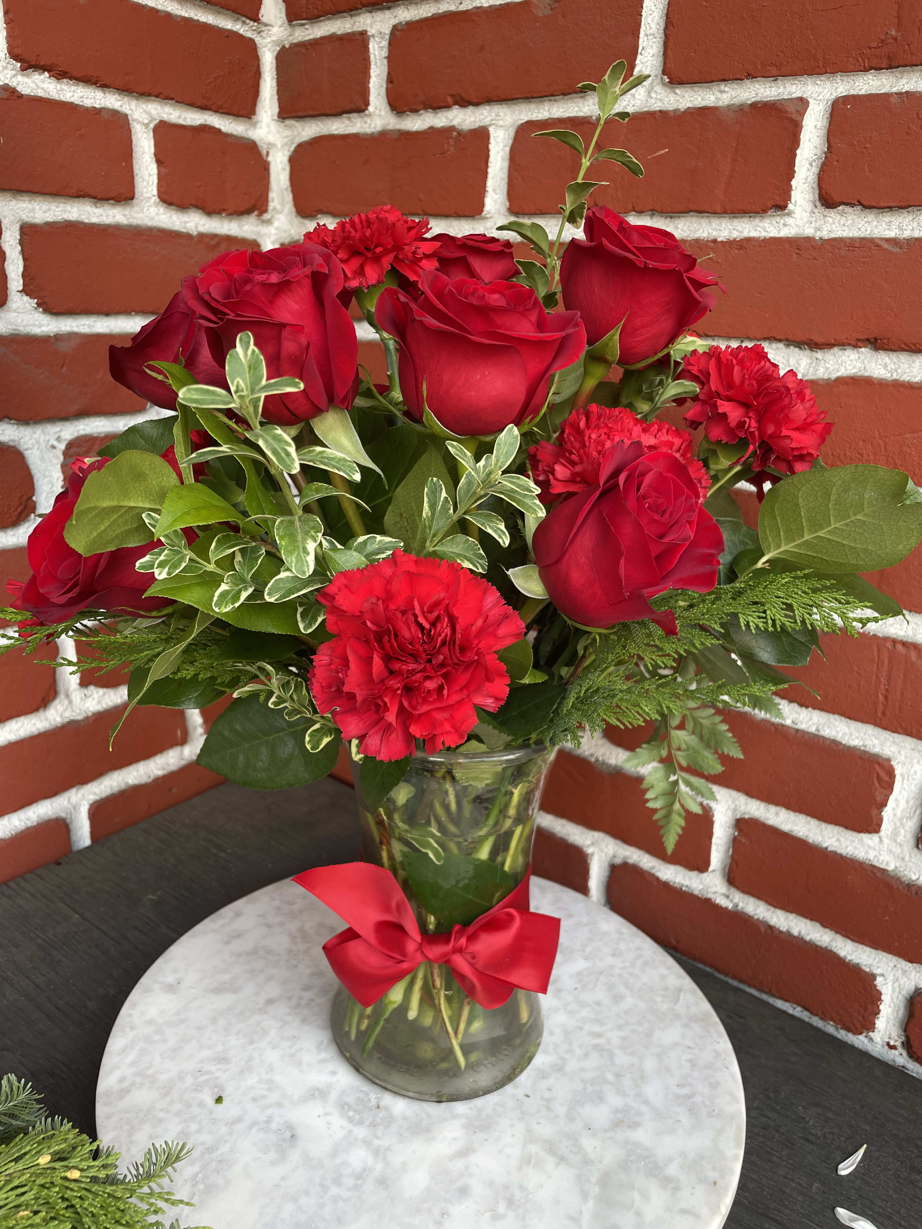 Red rose and Carnations All my Heart flower bouquet - Let your love bloom with this beautiful All My Heart flower bouquet. This all red flower arrangement is hand-arranged by Ginza florist near you with classic red roses, along with red carnations. All the red flowers make this gift a wonderful way of letting someone in your life know they are important to you and you appreciate all the love they give you. The red roses and carnations are delivered in a clear glass vase with a red ribbon tied around the center