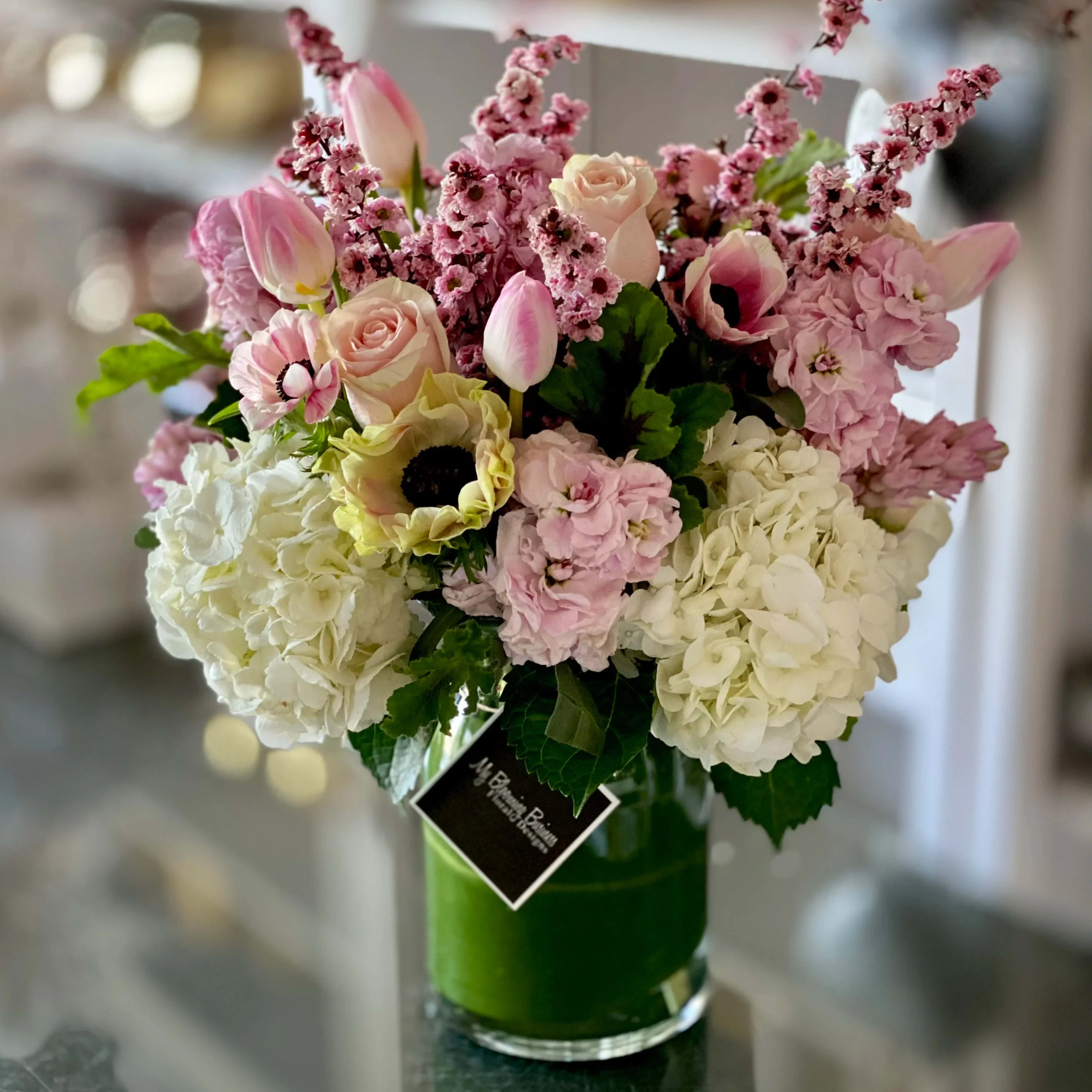 Express Yourself  - Do you want to let someone special know how you feel without saying a word? With the Express Yourself arrangement, you can do just that! This beautiful, luscious pink spring style arrangement will make them feel loved and appreciated. The mix of pink stock, tulips, roses, and anemones in a classic vase is the perfect way to show someone in your life how much you care. So don’t just say it, express it with the Express Yourself arrangement. It’s the perfect gift for any occasion!