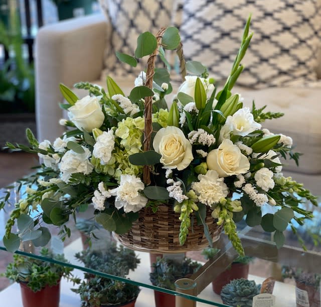 elegant basket - white flowers in basket with greens