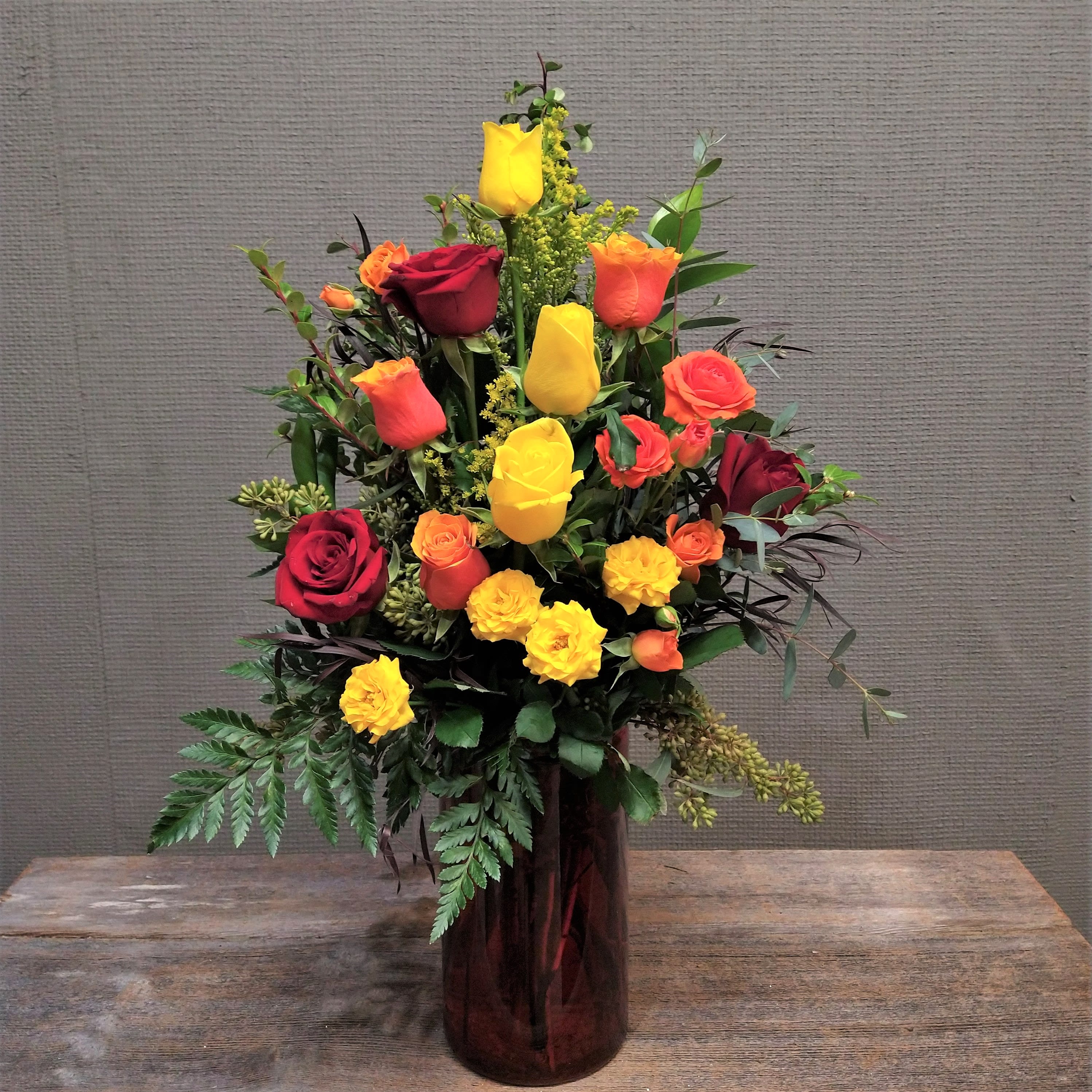 Eternal Flame - For the red hot romance. 9 full size roses and 3 spray roses create our flame of love.