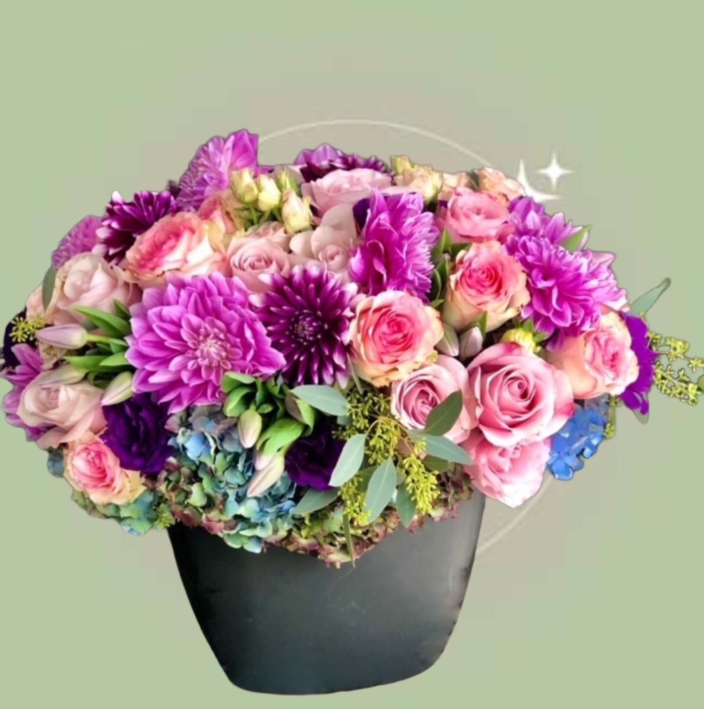 Burst of Springtime - PLEASE NOTE: Although we make all the effort to create a floral arrangement as close to the photo shown, the actual arrangement delivered may vary slightly in its appearance from the photo shown. If you have any questions about your order, we welcome you to call us in or email us to discuss further. Thank you!