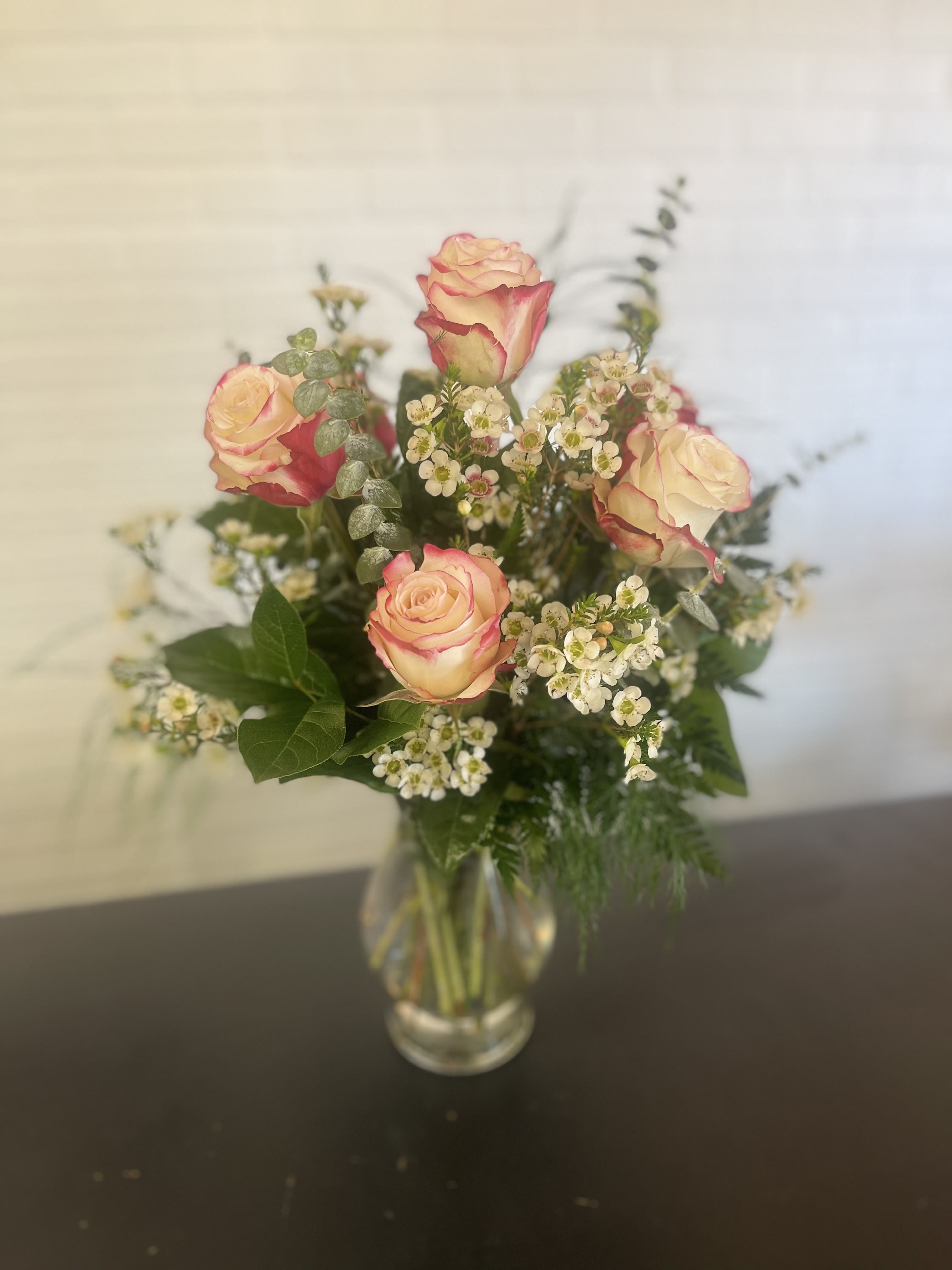 1/2 dozen Roses - 1/2 dozen vases rose arrangement.  PLEASE INDICATE FIRST AND SECOND CHOICE IF COLOR. 