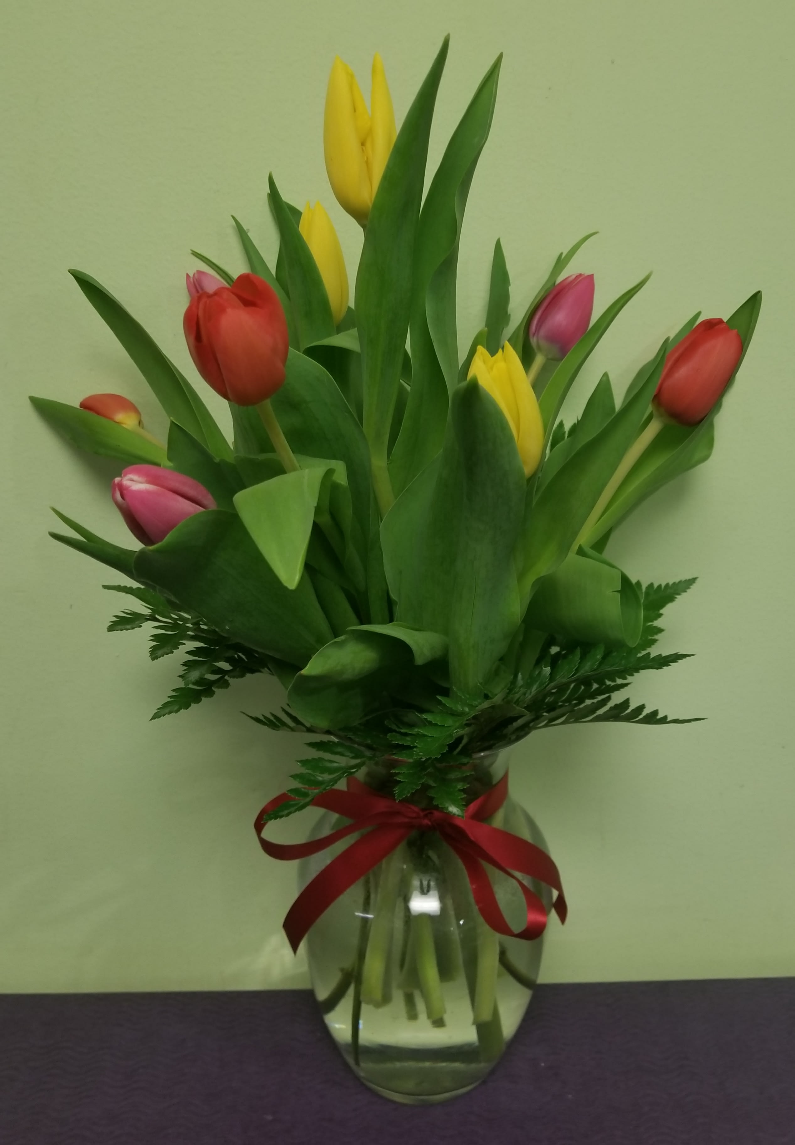 Assorted Tulips - This is the perfect Spring Arrangement. This is a beautiful mix of colorful tulips arranged in a perfect vase!