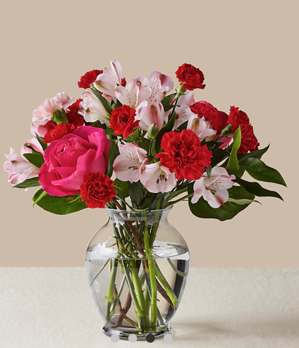 You're Precious Bouquet - Blushing shades of pink blooms are nestled in lush greens to charm anyone's day. This bouquet is abundant with a classic assortment of pretty florals – roses, alstroemeria and carnations to name a few.