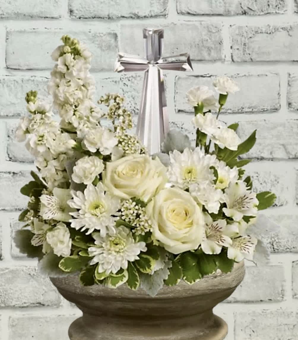 T2 29–2 9A TELEFLORA, the vine piece bouquet - An elegant display of faith and divine peace. This beautiful arrangement will come with a truly thoughtful and respectful way and exquisite Crystal Cross is surrounded by a bed of lovely blooms.