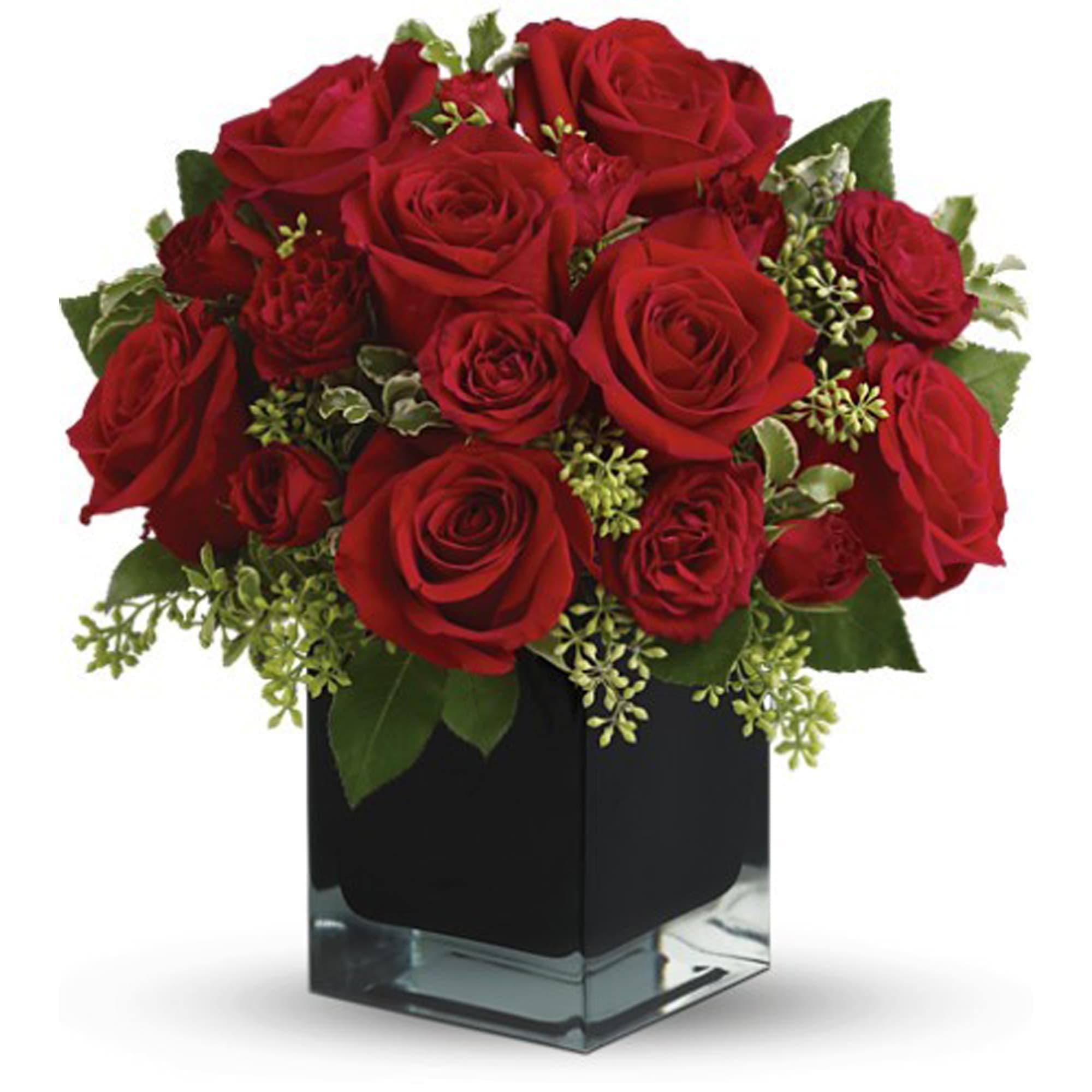 Teleflora's Ravishing Reds - Lush, lavish and spectacularly chic, this gorgeous contemporary bouquet of red roses in a stunning black cube vase makes an exciting gift for almost anyone. Wouldn't you love for someone to send it to you?  The brilliant bouquet includes red roses and red spray roses.  Delivered in a black contemporary glass cube vase.  Bouquet is approximately 11.5&quot; H x 10.75&quot; W  Orientation: All-Around  As Shown : TFWEB596