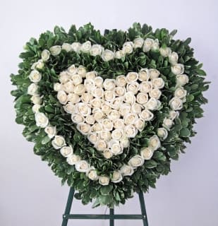 Peaceful Heart  - A heartfelt sympathy arrangement to a dearly beloved who has now returned in the arms of God! Your message of condolences and peaceful departing will always be remembered...