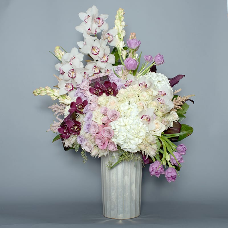Roses, Orchids, Tulips and Everything Nice - Tall arrangement with cymbidium orchids, tulips, roses, hydrangea and more