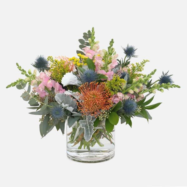 Wild Song - A mixture of fresh wild protea, snapdragons, thistle and dusty miller
