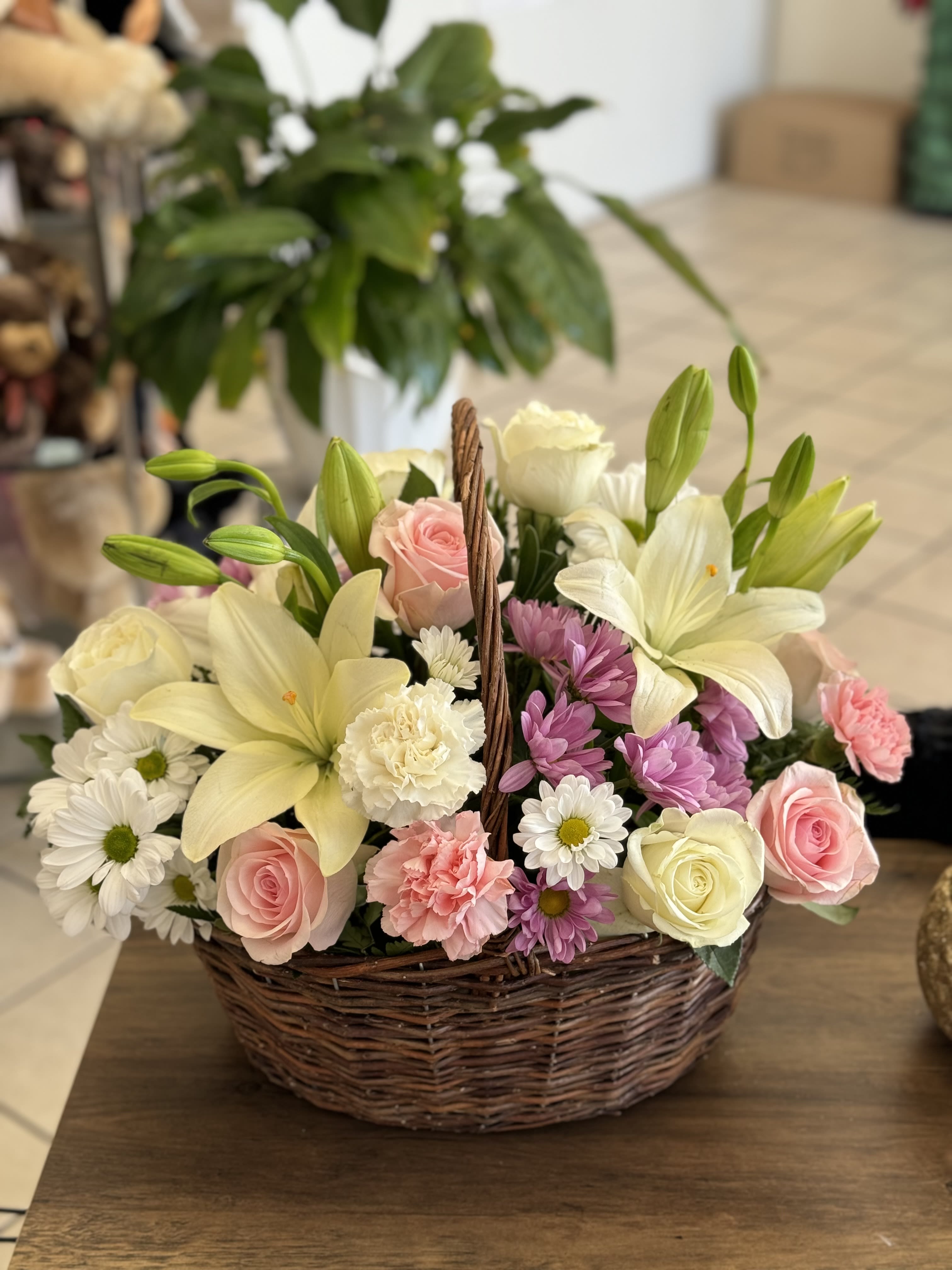 White and pink florals in wicker basket  - A beautiful combination of white and pink florals arranged in a wicker basket 