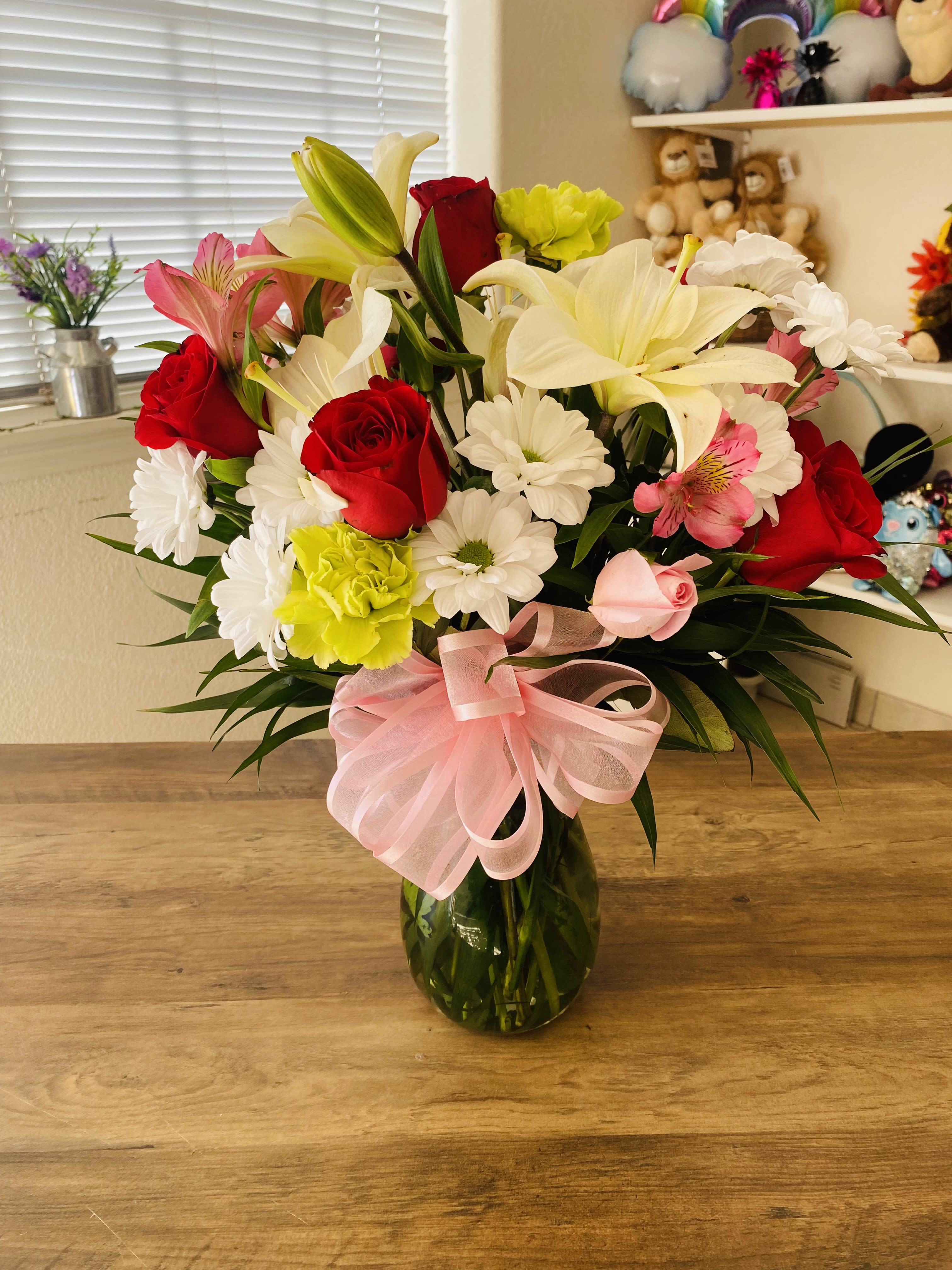 Just for You - A beautiful soft colored arrangement with just the right soft accent to surprise that love one on any occasion to assure them it’s Just for You! 