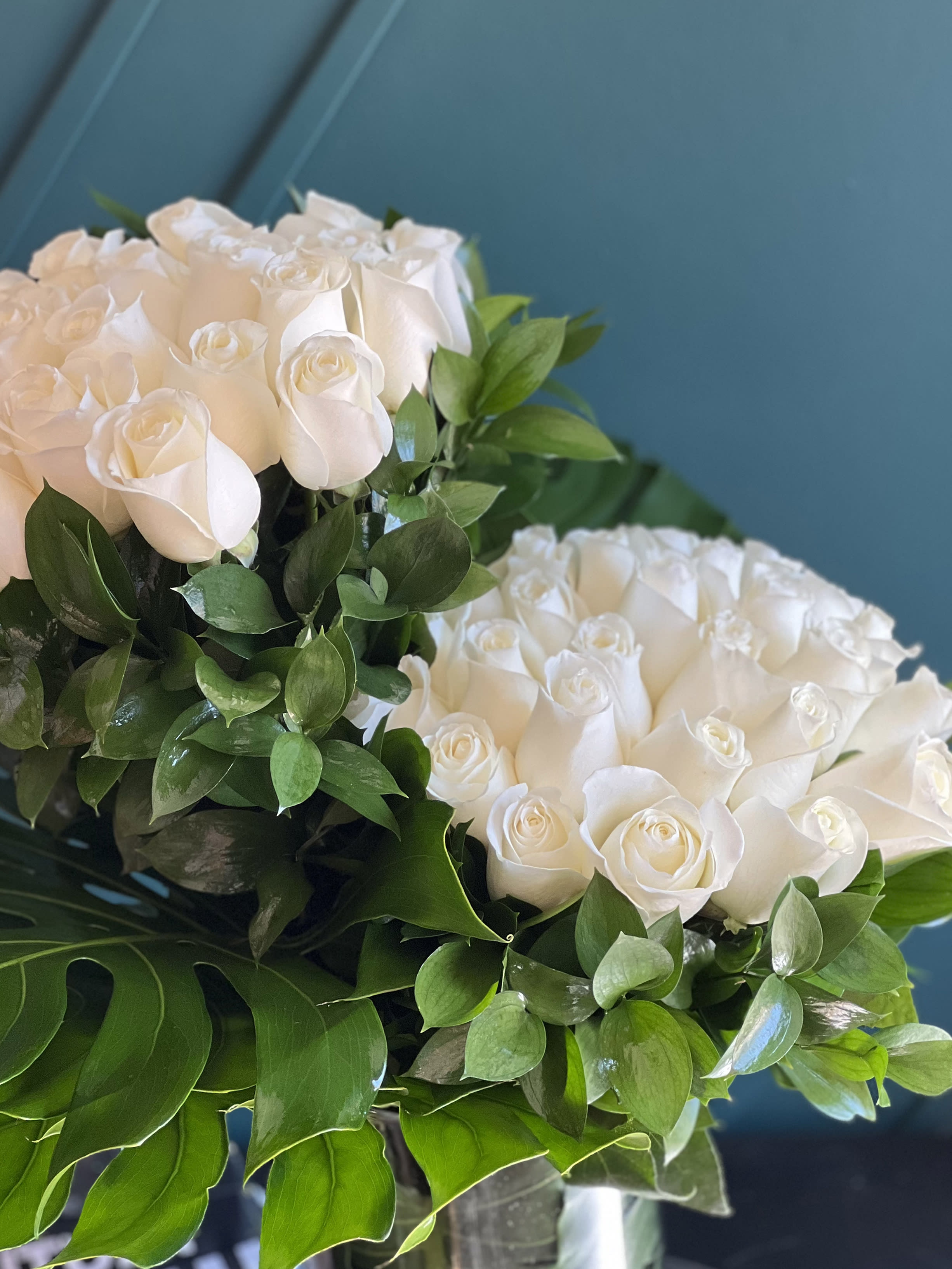 50 WHITE ROSES IN A VASE  - 50 white roses design with greenery in a vase 