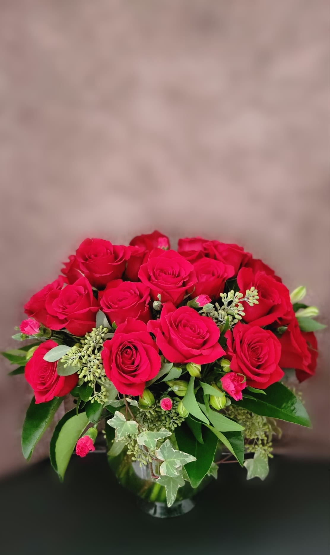 Meaning of Love - A vase of 2 dozen of red roses filled with other blooms