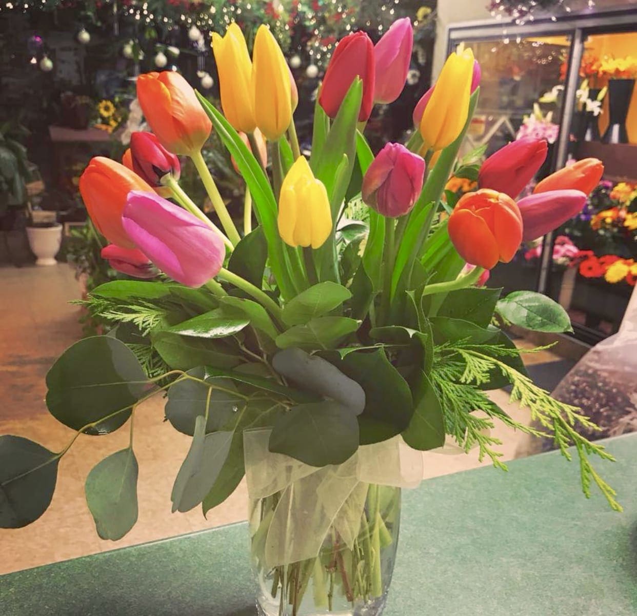Colorful tulips Colorful tulips - Fresh large bulb tulips in a clear glass vase