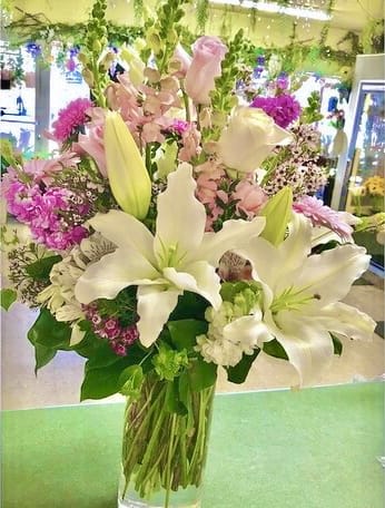 Ohh Snap Ohh Snap - Premium roses, beautiful lilies, snapdragon, lush stock, alstroemeria and gerbera daisies in a tall cylinder vase perfect for that special occasion.