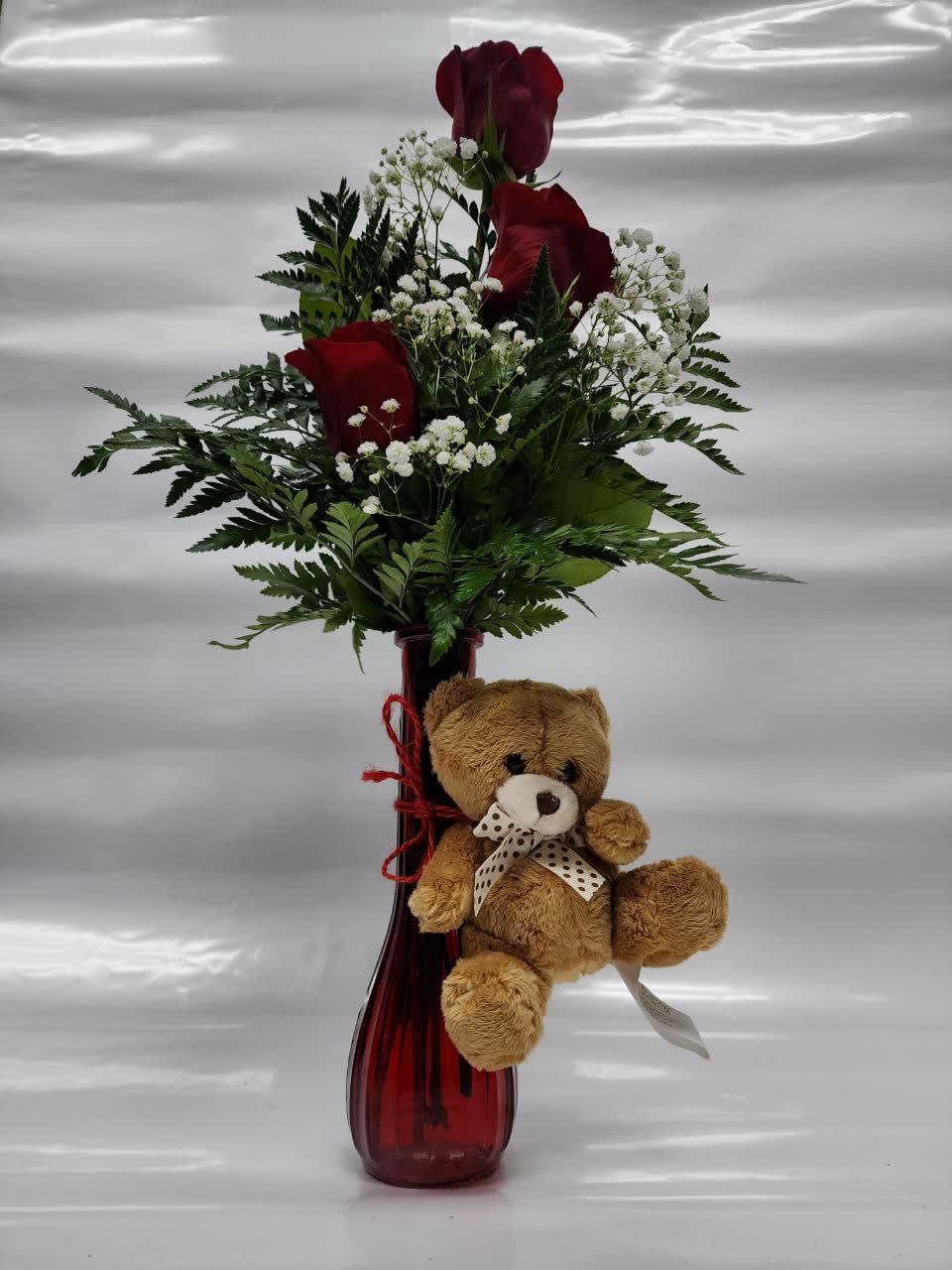 Jut You  - 3 Red Roses   in a Red Bubo vase ,white baby breath  with  a  small teddy bear.  