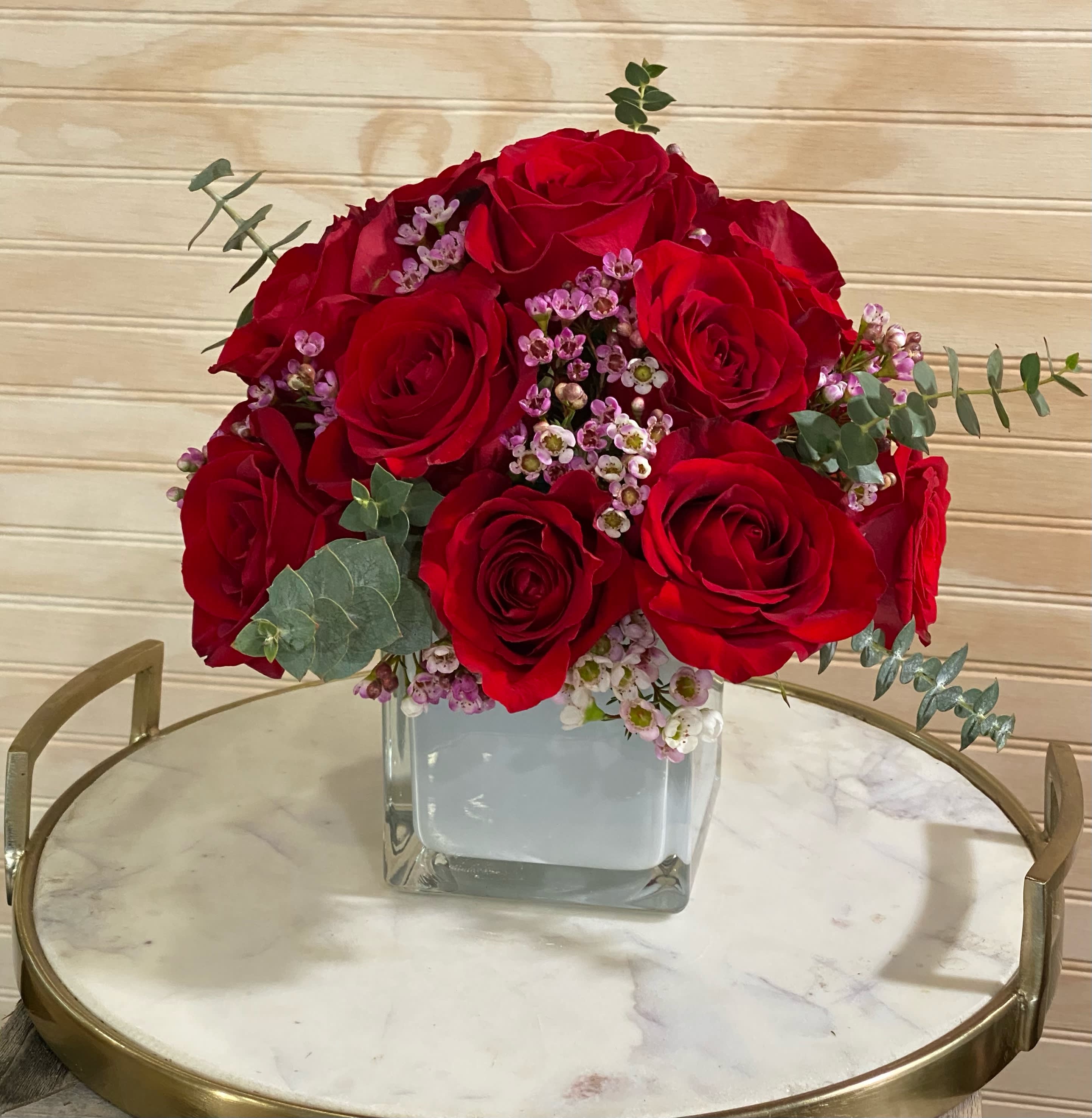 Toya Cube Toya Cube - Standard 1 dozen beautiful roses in 4x4", mixed with eucalyptus and wax flower. She will make anyone's Valentine's special. SUBSITUTION POLICY In many instances, our photo may represent an overall theme or look and include a one-of-a-kind vase which cannot be exactly replicated. Although the actual bouquet may not precisely match the photo, its temperament will. Occasionally, substitutions of flowers and/or containers happen due to weather, seasonality and market conditions which may affect availability. If this is the case with the gift you’ve selected, we will ensure that the style, theme and color scheme of your arrangement is preserved and will only substitute items of equal value or higher value. If any design elements are of major importance to your order, please include them in the florist instructions at checkout or contact us to ensure availability. Deluxe 18 beautiful roses in 5x5"glass cube mixed with eucalyptus and wax flower. She will make anyone's Valentine's special. chose of rose color: yellow, orange, red, bright pink, light pink, lavender SUBSITUTION POLICY In many instances, our photo may represent an overall theme or look and include a one-of-a-kind vase which cannot be exactly replicated. Although the actual bouquet may not precisely match the photo, its temperament will. Occasionally, substitutions of flowers and/or containers happen due to weather, seasonality and market conditions which may affect availability. If this is the case with the gift you’ve selected, we will ensure that the style, theme and color scheme of your arrangement is preserved and will only substitute items of equal value or higher value. If any design elements are of major importance to your order, please include them in the florist instructions at checkout or contact us to ensure availability.