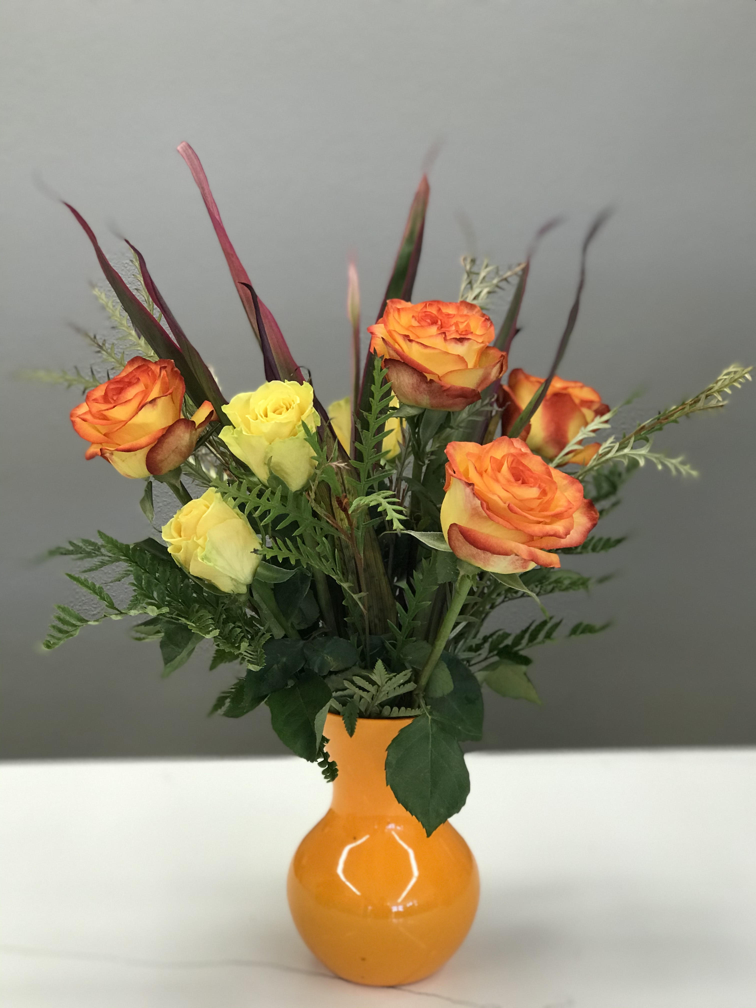 Falling in Love  - Fall colored roses and greens reminding you of the cozy romantic season ahead. 