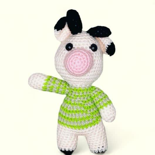 little pig with green shirt little pig with green shirt - Discover the charm of our Gift Shop's exclusive collection – One of a Kind handmade knit/crochet toys and dolls. Each piece is a quality keepsake and treasure, meticulously crafted from the finest natural wool and cotton. Every creation is a unique masterpiece, with our artisans pouring their hearts into every stitch. These are more than mere gifts; they are timeless prices that create cherished memories, destined to last a lifetime.