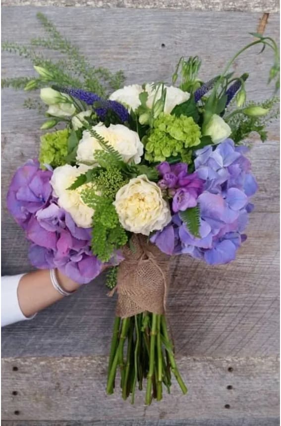 Designer Choice Designer Choice - A mix of beautiful seasonal flowers arranged in a decorated hand tied bouquet
