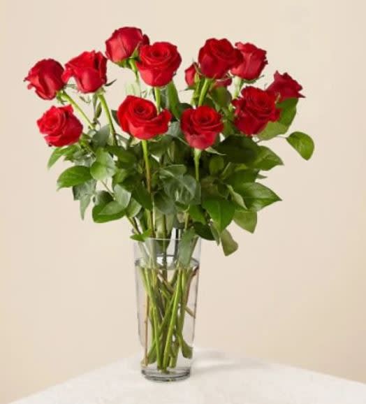 Long Stem Red Rose Bouquet – 12 Red Roses - You can never go wrong with a bouquet of hand delivered long stem red roses from a local florist. Let our network of expert florists design this timeless red bouquet to make a statement for your special someone. Red flowers are an elegant, iconic and romantic gift for anyone close to your heart. Each rose is handcrafted, and hand delivered to say I love you directly to their home or office.