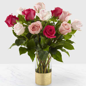 FTD Love &amp; Roses™ Bouquet - An elegant mix of roses is perfect for saying, &quot;our love is timeless,&quot; or &quot;you are my favorite part of everyday&quot;. Set in a clear glass vase with a metallic gold, hammered honeycomb base and accented by luscious greenery, our florists have created an arrangement of romantic roses that is a classic beauty for your darling. Share your love with a simply sweet bouquet of 12 red roses, or a lush and full arrangement of 24 roses. GOOD bouquet is approx. 18&quot;H x 15&quot;W. BETTER bouquet is approx. 19&quot;H x 18&quot;W. 