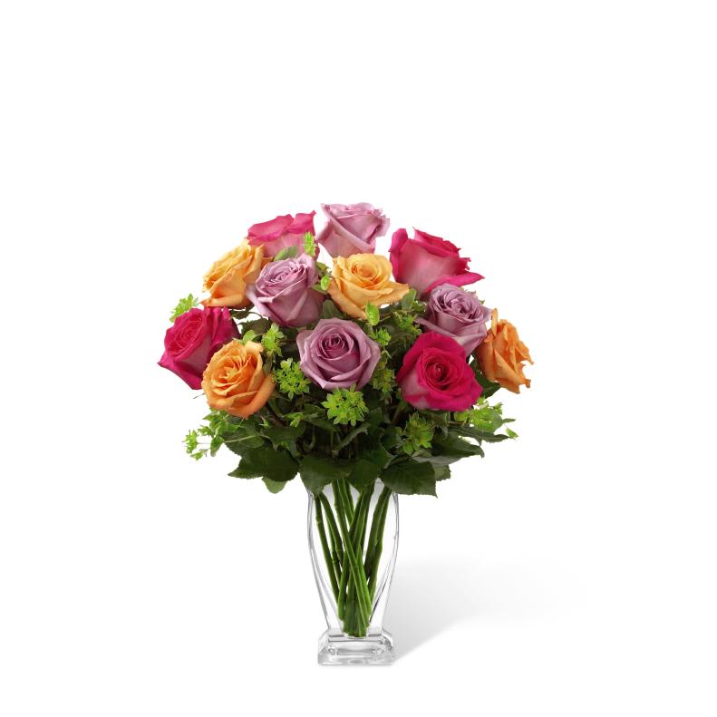 FTD Pure Enchantment Rose Bouquet - The FTD Pure Enchantment Rose Bouquet blossoms with brilliant roses in  bright hues to capture your special recipient's every attention. Hot  pink, lavender and orange roses create a splash of color accented with  lush bupleurum to make an exceptional flower bouquet. Presented in a  modern clear glass vase, this rose bouquet is set to send your warmest  wishes for their birthday, as a thank you gift or to celebrate any of  life's special moments. GOOD bouquet includes 12 stems. Approx. 18H x  12W. BETTER bouquet includes 18 stems. Approx. 20H x 14W. BEST  bouquet includes 24 stems. Approx. 24H x 18W. 