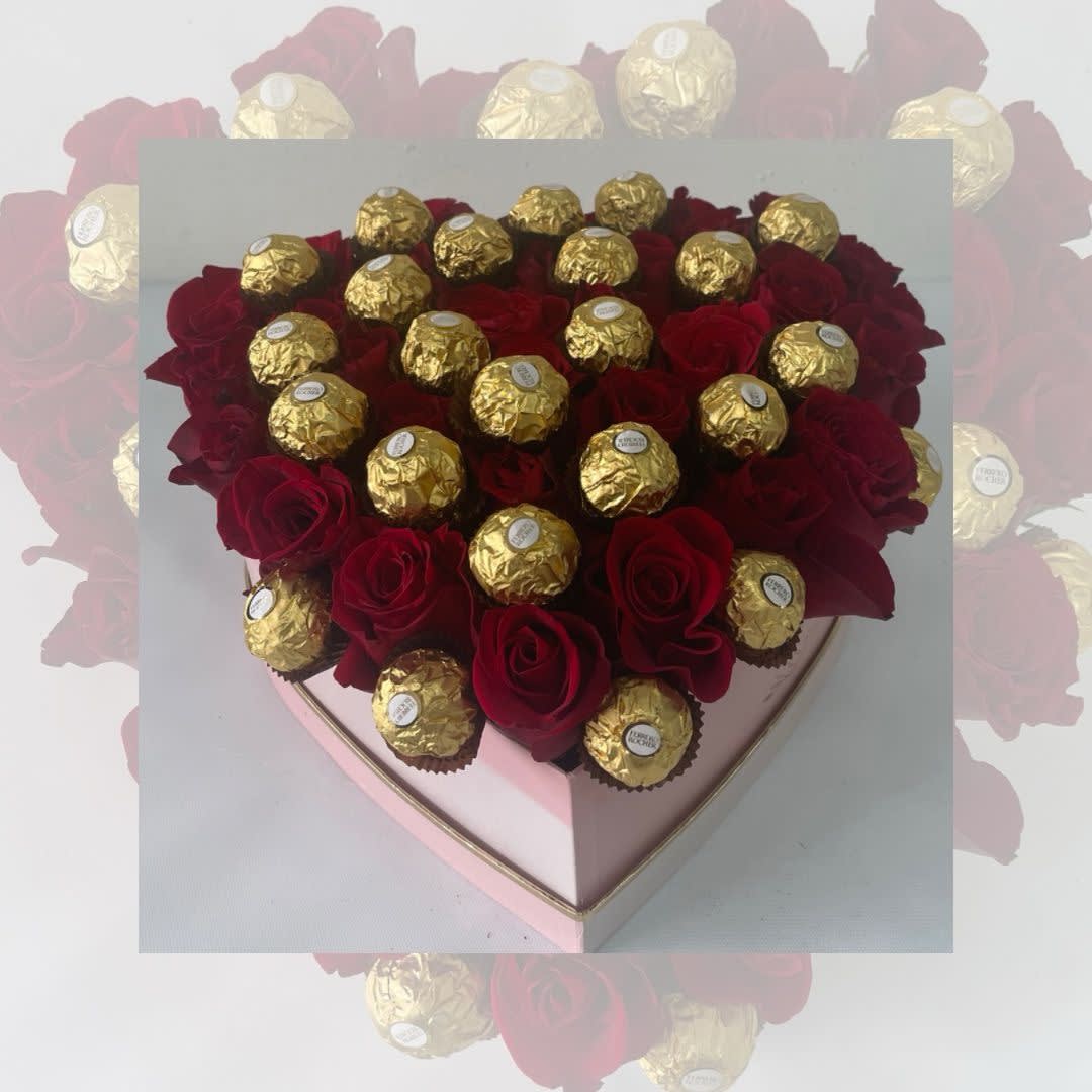 SWEET ROSE - RED ROSES AND FERRERO CHOCOLATES COVER A HEART SHAPE BOX. BEUTIFUL ARRANGEMENT THE EXPRESS ALL YOUR LOVE