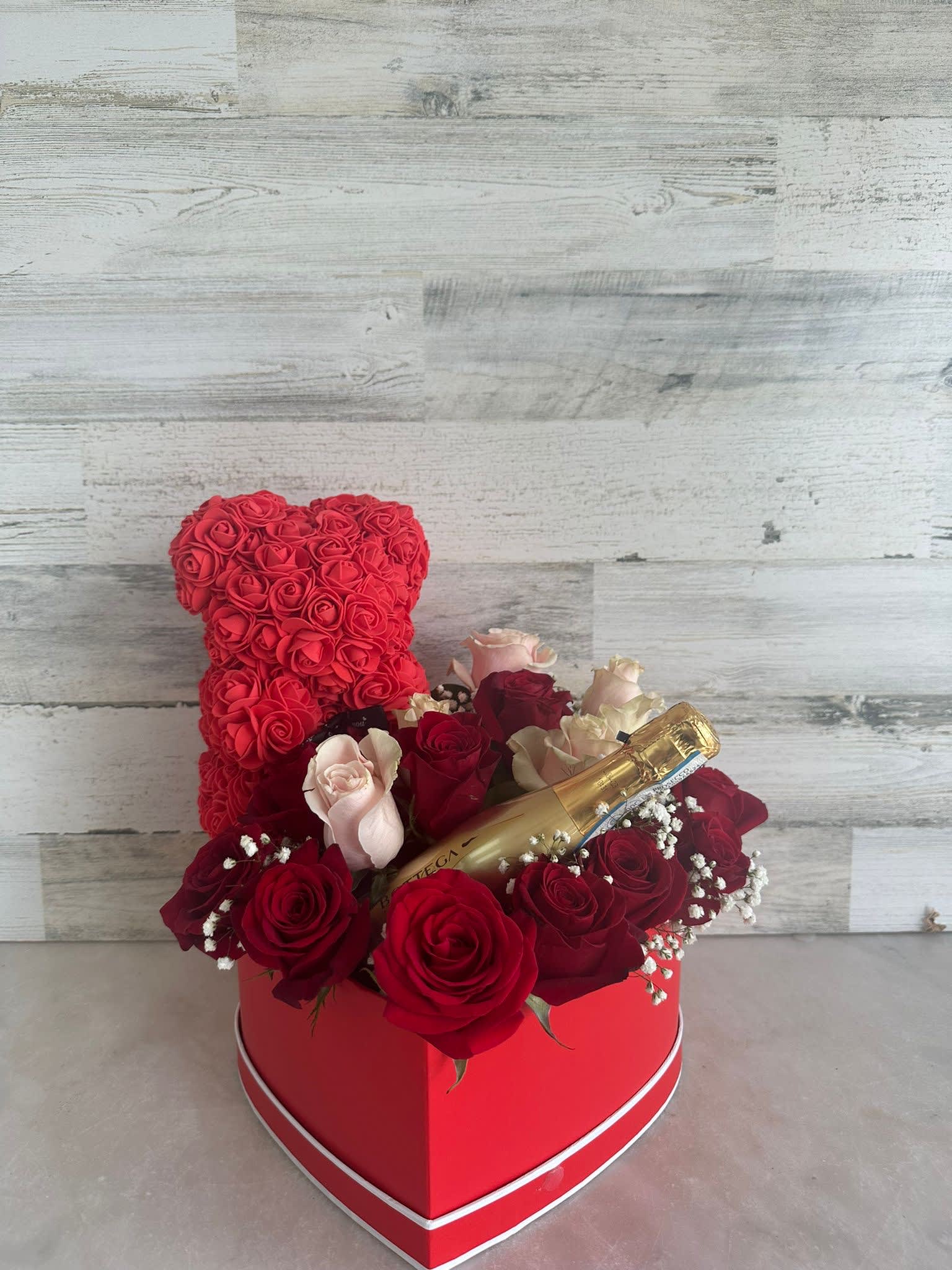 ALL TOGHETHER - ROSES IN A HEART SHAPE WITH A FOAM ROSES BEAR AND A PROSECCO..... GIVE THIS AND JUST CHEER!!
