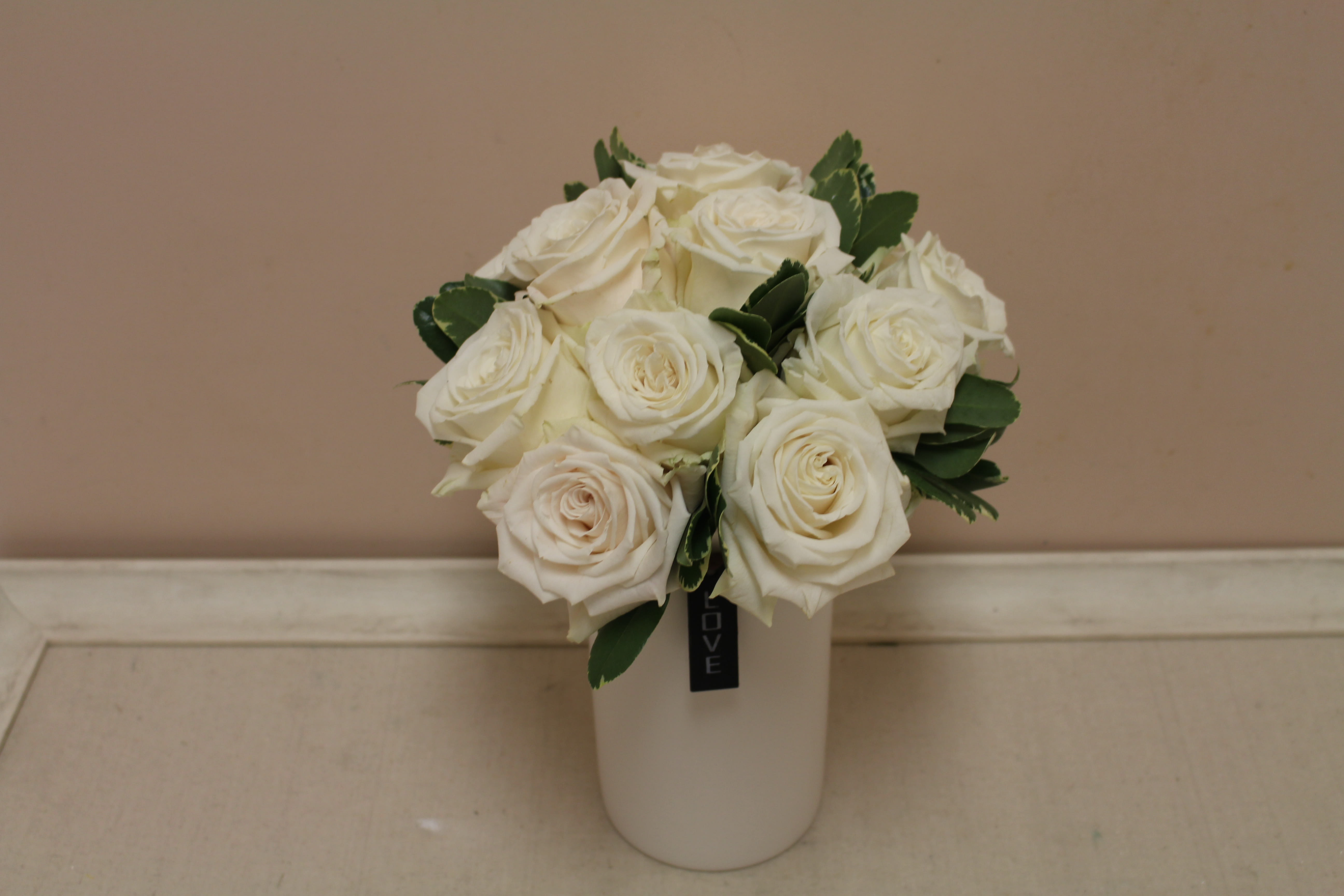 Stop in the name of Love - A dozen playa blance roses, tussie mussie style  In a sleek vase with a &quot;love&quot; tag