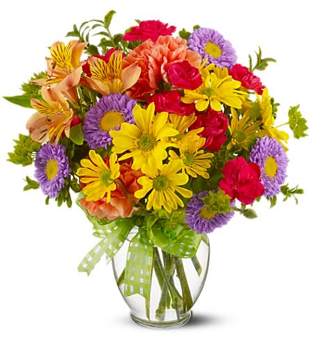 Make a Wish - A summery mix of yellow daisy chrysanthemums purple asters and hot pink and orange carnations - arranged in a clear ginger vase and adorned with a cheerful yellow plaid bow - will make their wishes come true! Yellow daisy spray chrysanthemums purple Matsumoto asters hot pink miniature carnations orange carnations and alstroemeria - accented with bupleurum - are delivered in a miniature ginger vase adorned with a plaid yellow ribbon. Approximately 9&quot; (W) x 12&quot; (H) Orientation: All-Around As Shown