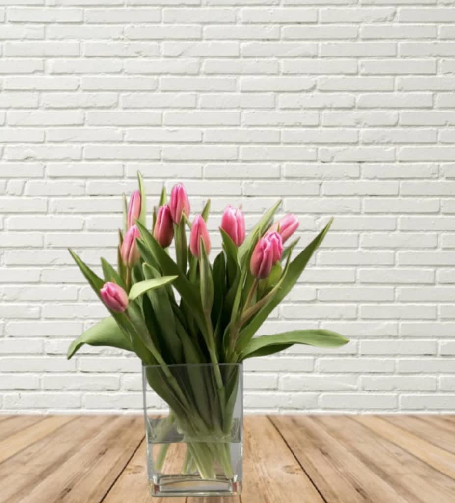 Send One For Your Love - Brightly colored tulips in rectangle vase.  If ordered out of season for unable to get a specific color we will make appropriate substitutions.