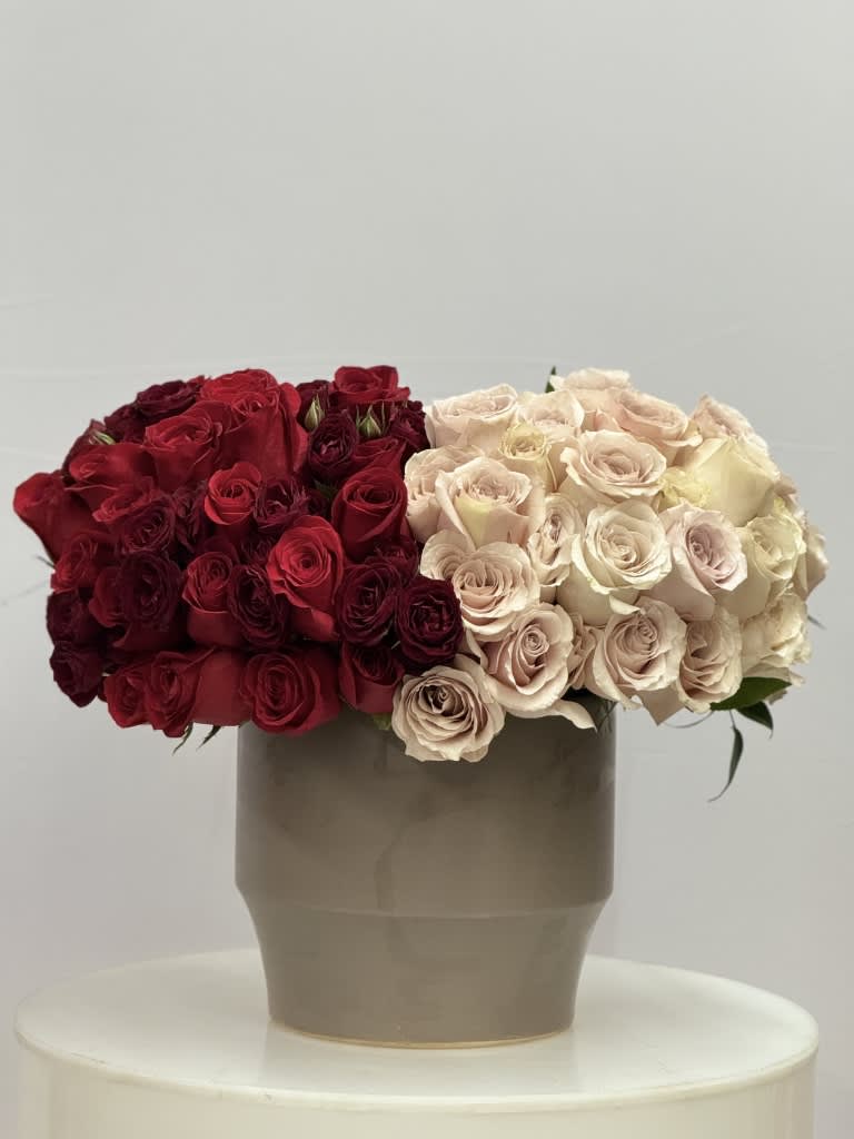My other half - My oh, my! What red roses do to one's eyes. Show the special someone in your life how much you care with timelessly beautiful red roses. Known globally as a classic demonstration of love and dedication, gifting these fresh flowers will not only speak for themselves but for you, too!