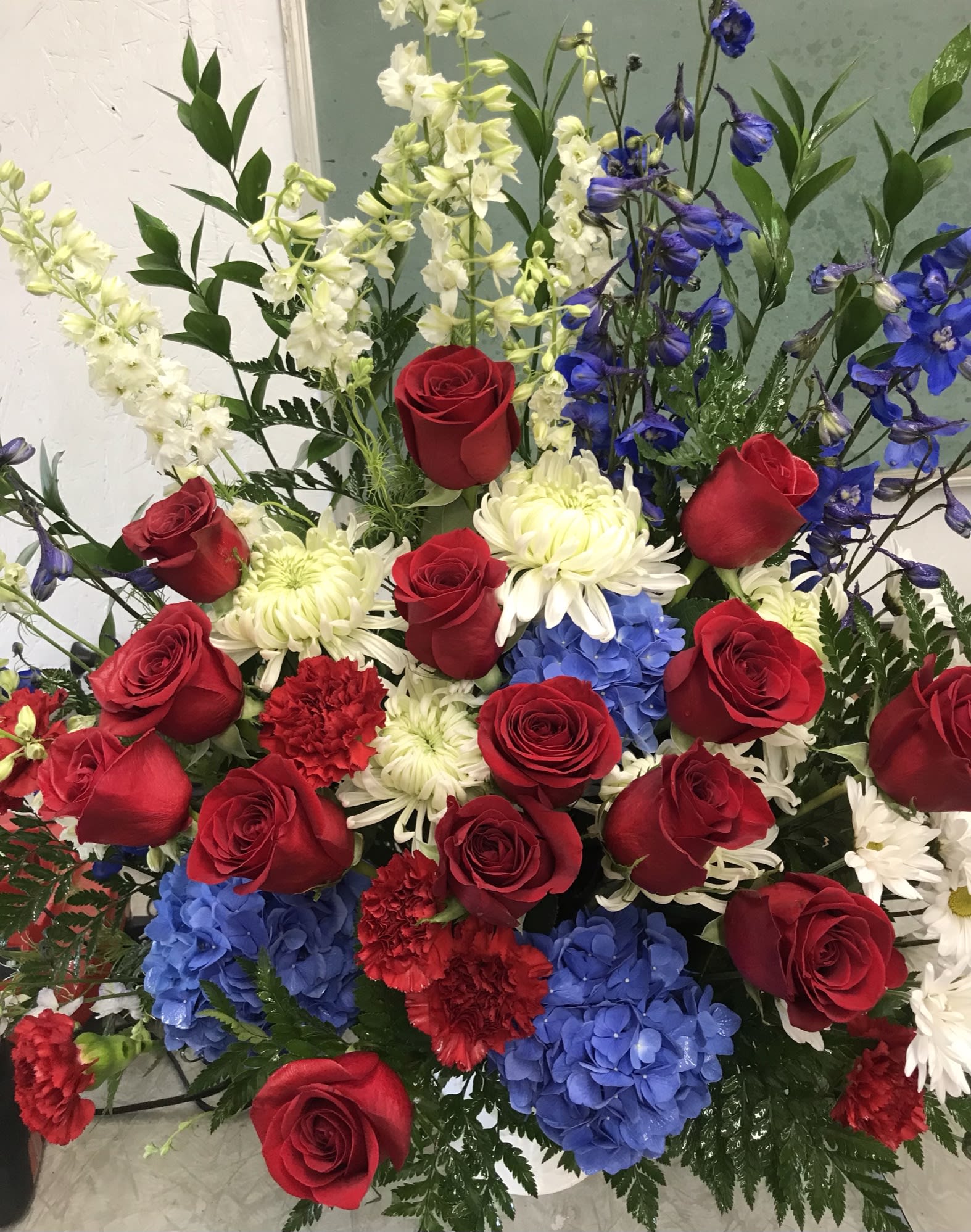 Salute Funeral Basket  - This is a red, white and blue array of flowers 