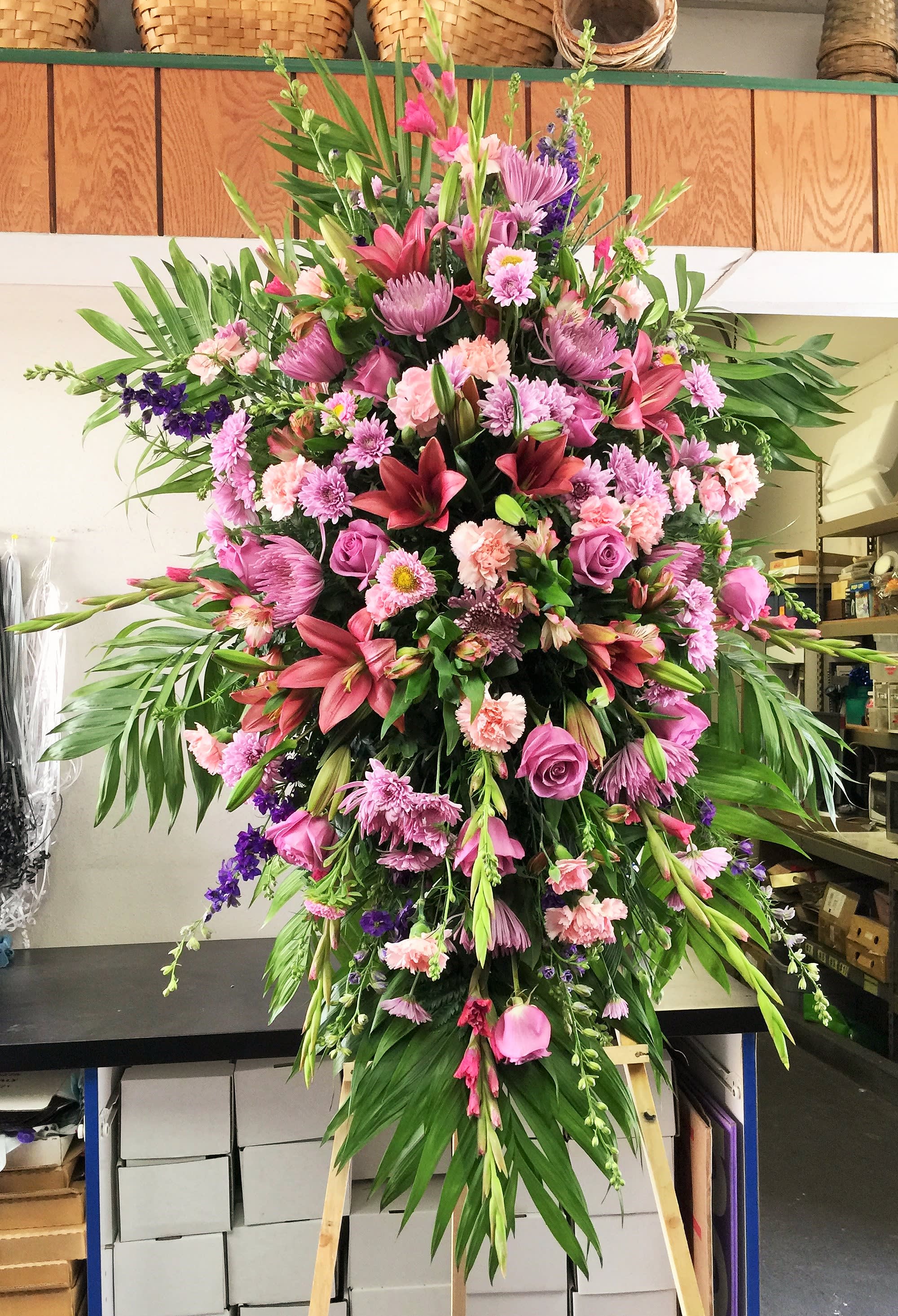 1026.SSG      Standing Spray   - Lavender  and pink flowers AS SIMILAR AS POSSIBLE Substitution based on season, flowers availability or any unforeseen or uncontrollable circumstances 