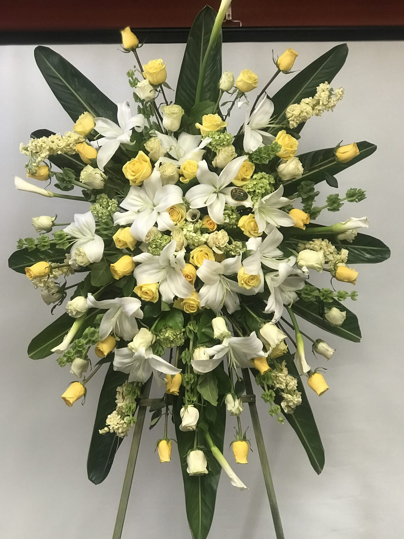 Cod 1355 - Roses, Lilies, Mix Flowers  AS SIMILAR AS POSSIBLE Substitution based on season, flowers availability or any unforeseen or uncontrollable circumstances 