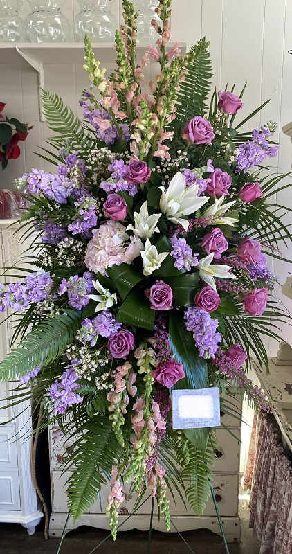 Sacred Garden Spray Sacred Garden Spray - A lovely lavender spray of flowers lets you share your compassion, hope and beauty with all. Beautifully simple. Beautifully serene. It's the perfect way to send your sincere sympathy.