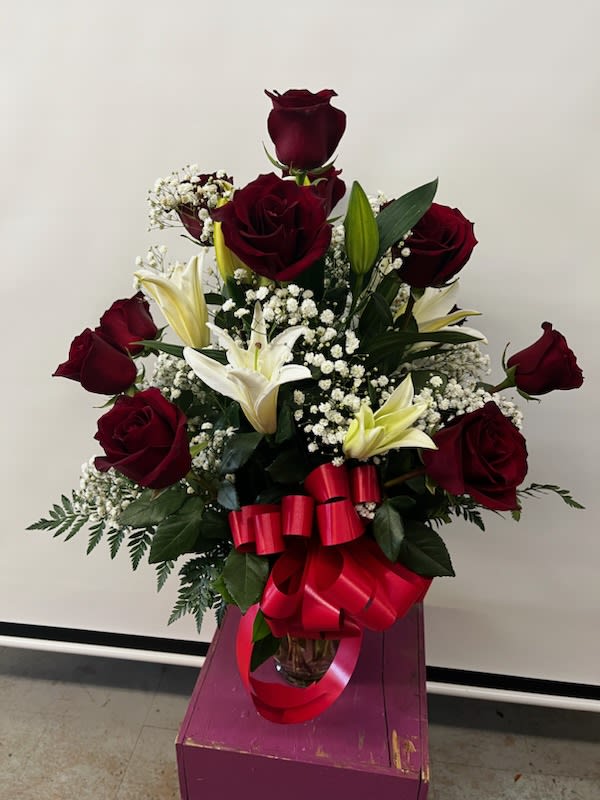 Dz red Roses and white lily's  - Beautiful Ecuadorian Red roses with a nice oriental lilies designed in a 11 inch vase perfect for any special occasion  