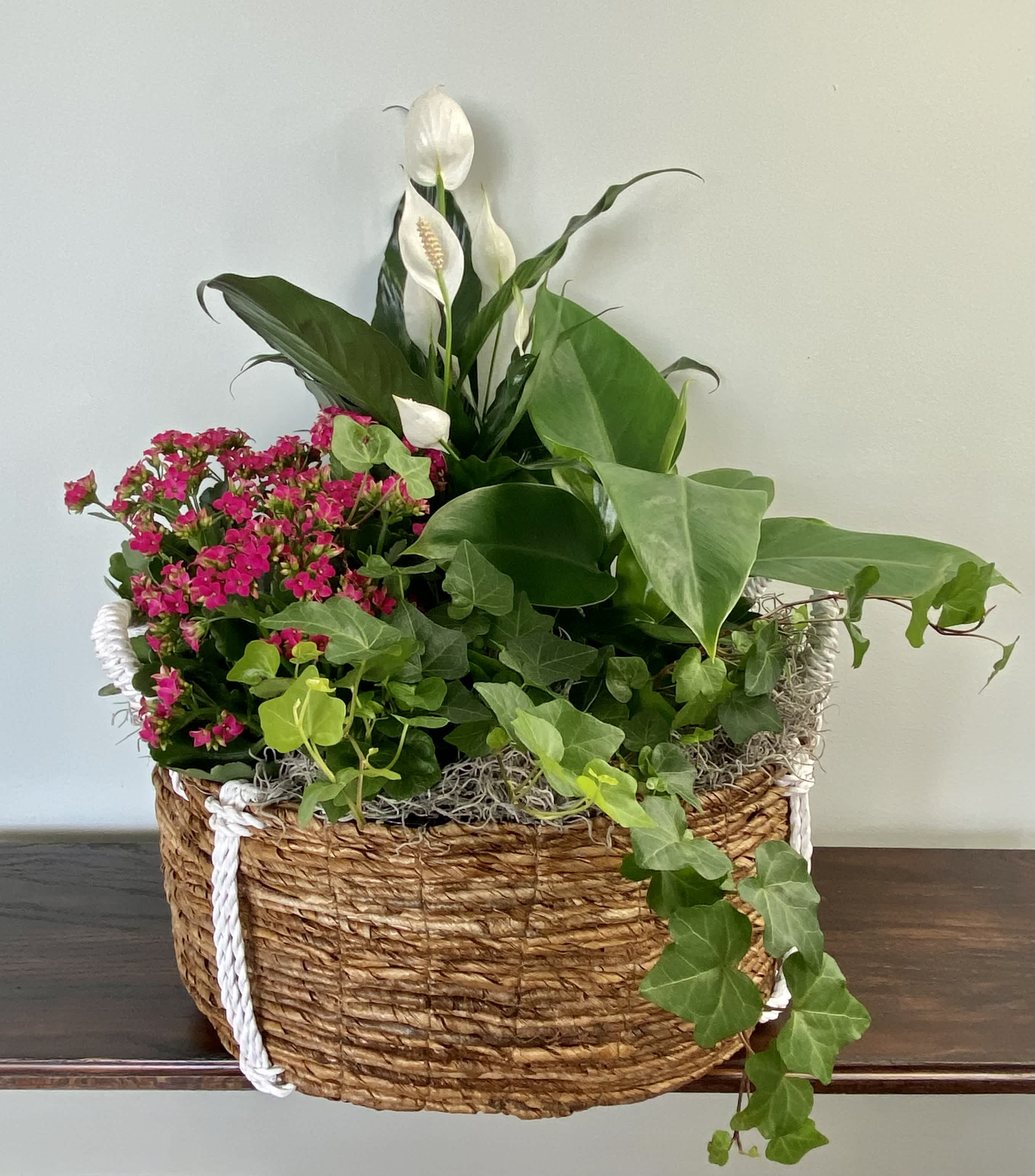 Flowering Plant Basket - A symphony of elegant blooming plants and greenery plants.  Colors may be customized upon request. 