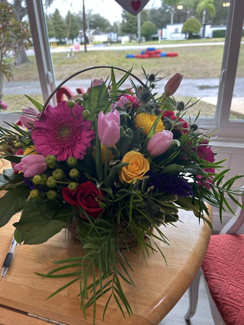 Enchanting Elegance Basket Enchanting Elegance Basket - This exquisite arrangement is a symphony of colors, textures, and fragrances. Each flower in the Enchanting Elegance Bouquet has been meticulously chosen for its freshness, vibrant color, and unique beauty, ensuring that your gesture of love, appreciation, or celebration stands out.