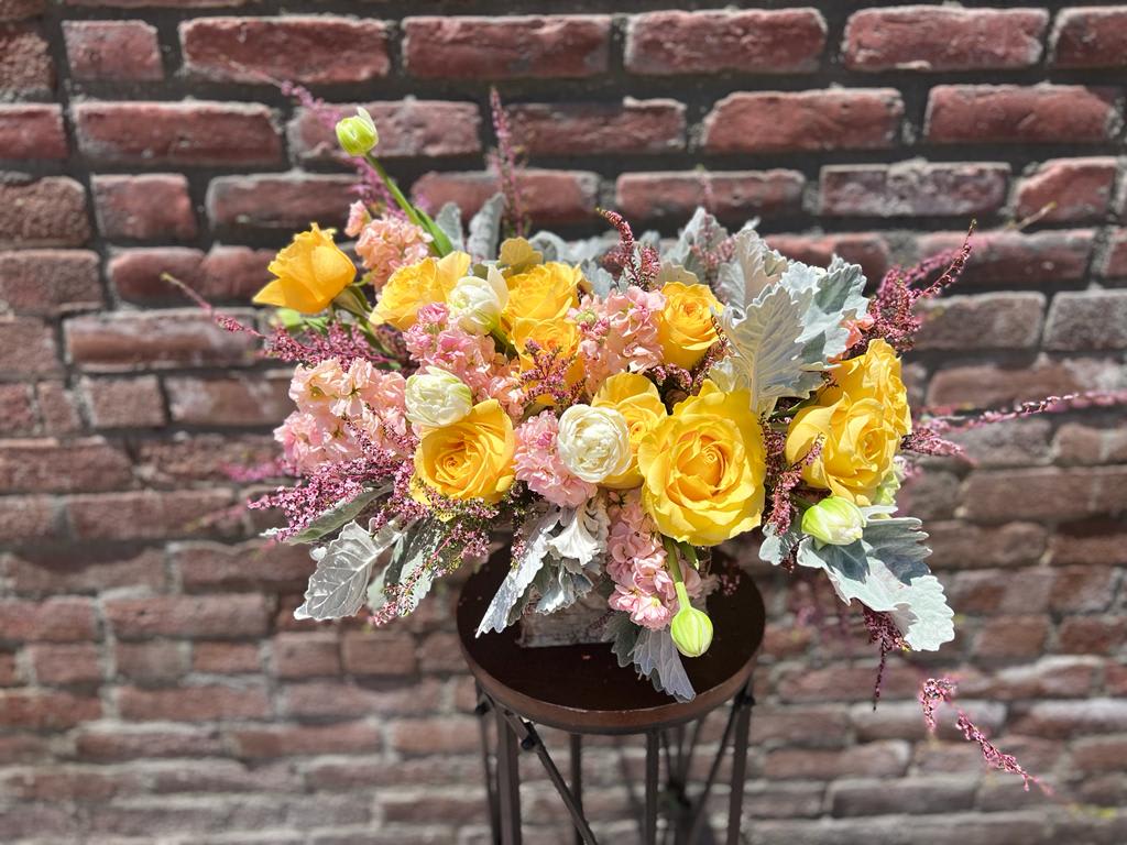 Pastel Dreams Pastel Dreams - composed of Dusty miller, peach stock, white tulips and yellow roses. comes in a birch box