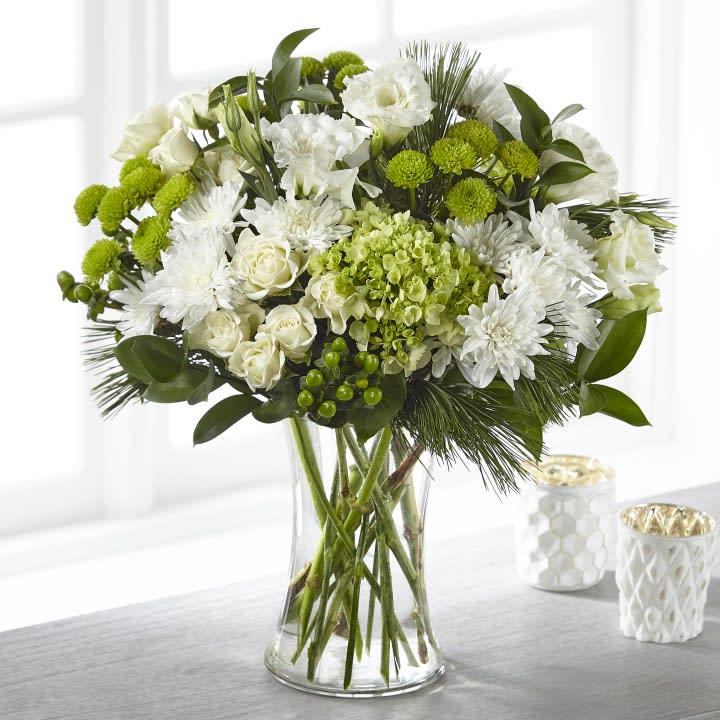 The FTD® Thoughtful Sentiments™ Bouquet The FTD® Thoughtful Sentiments™ Bouquet - Our Thoughtful Sentiments™ Bouquet offers symbolic white and green flowers to share your reverence. This stunning arrangement is crafted with hydrangea, lisianthus and spray roses to serve as a thoughtful reminder of your support and love. This bouquet is best fit to share your sympathies in their home or residence. Details: o Good bouquet is approximately 17"H x 14"W o Better bouquet is approximately 18"H x 15"W o Best bouquet is approximately 19"H x 16"W