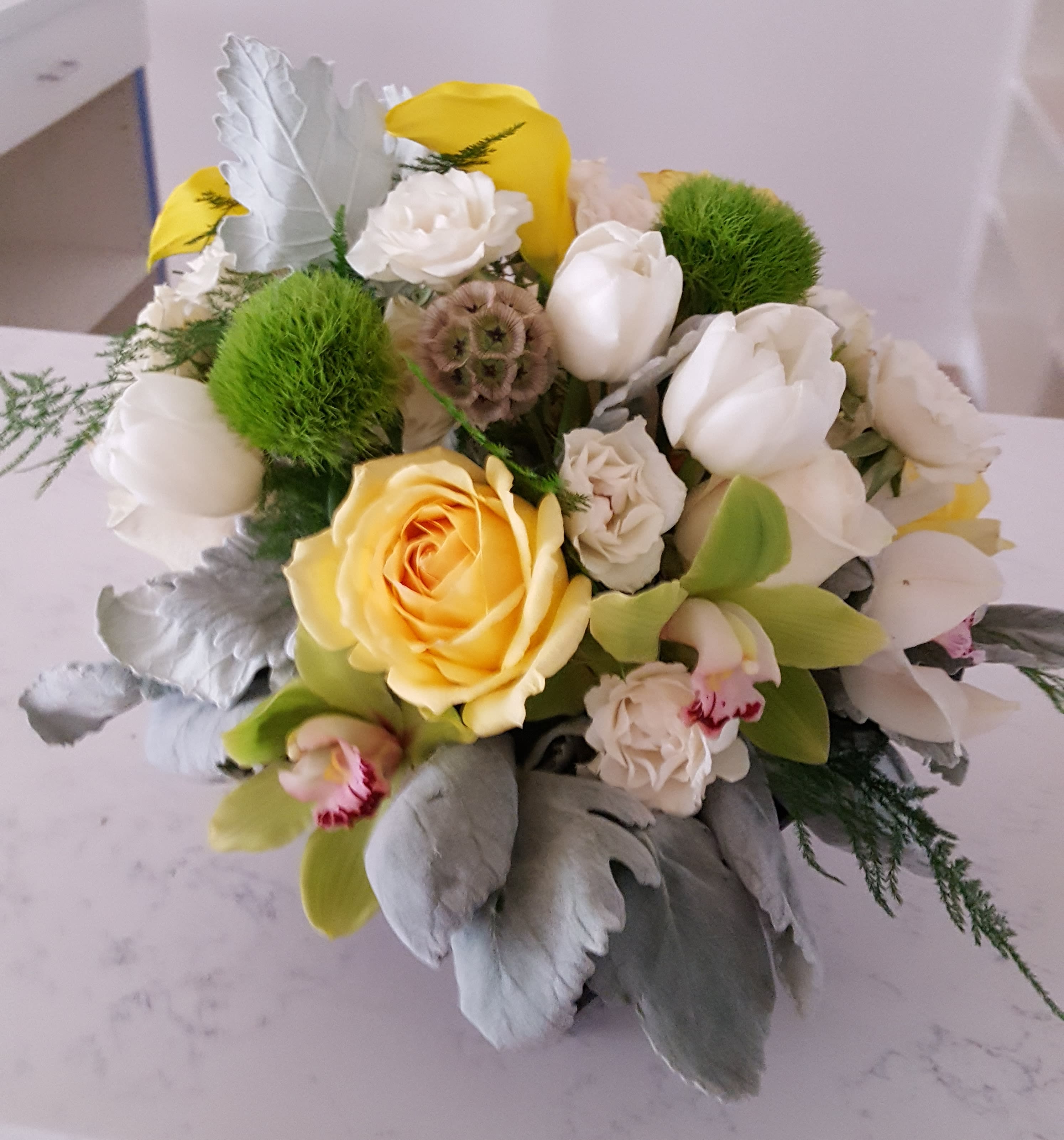 Spring Rose Spring Rose - Composed of Roses, Orchids, Tulips, Calla Lilies, Scabiosa.