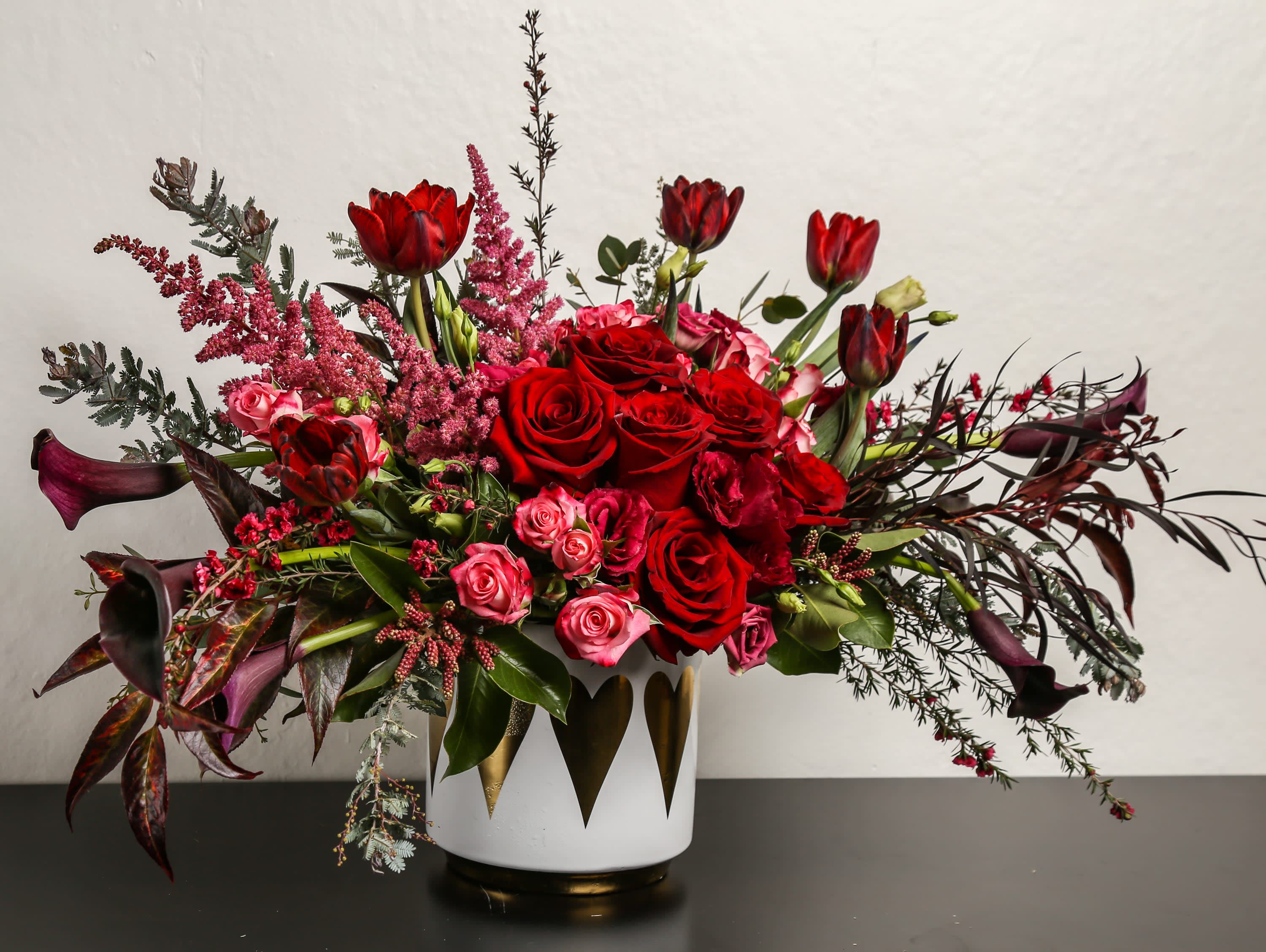 Heart of Gold Heart of Gold - Composed of roses, spray roses, Cala lily, tulips.