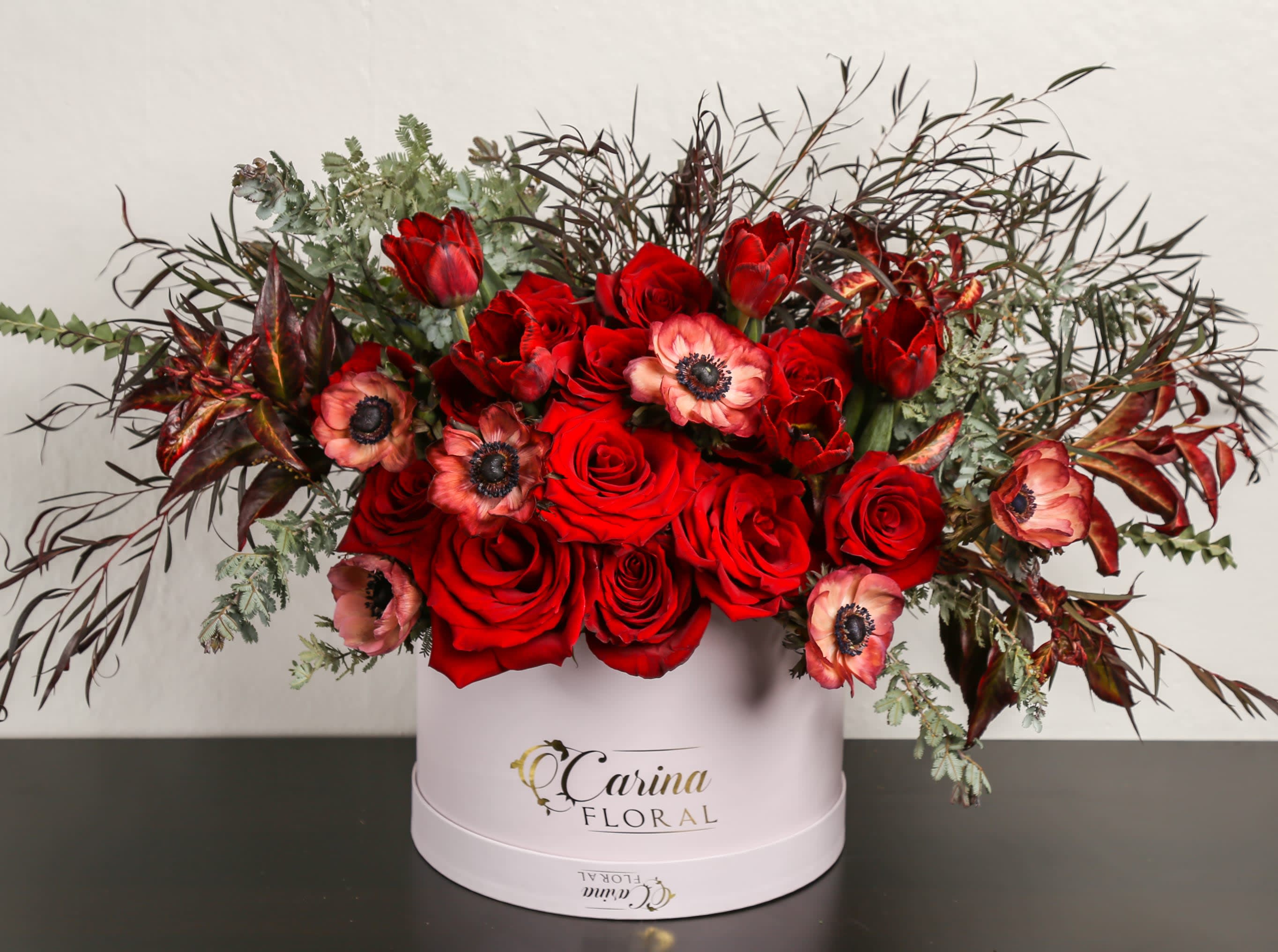 Lasting Love Lasting Love - Composed of roses, anemone, tulips, variety of green.