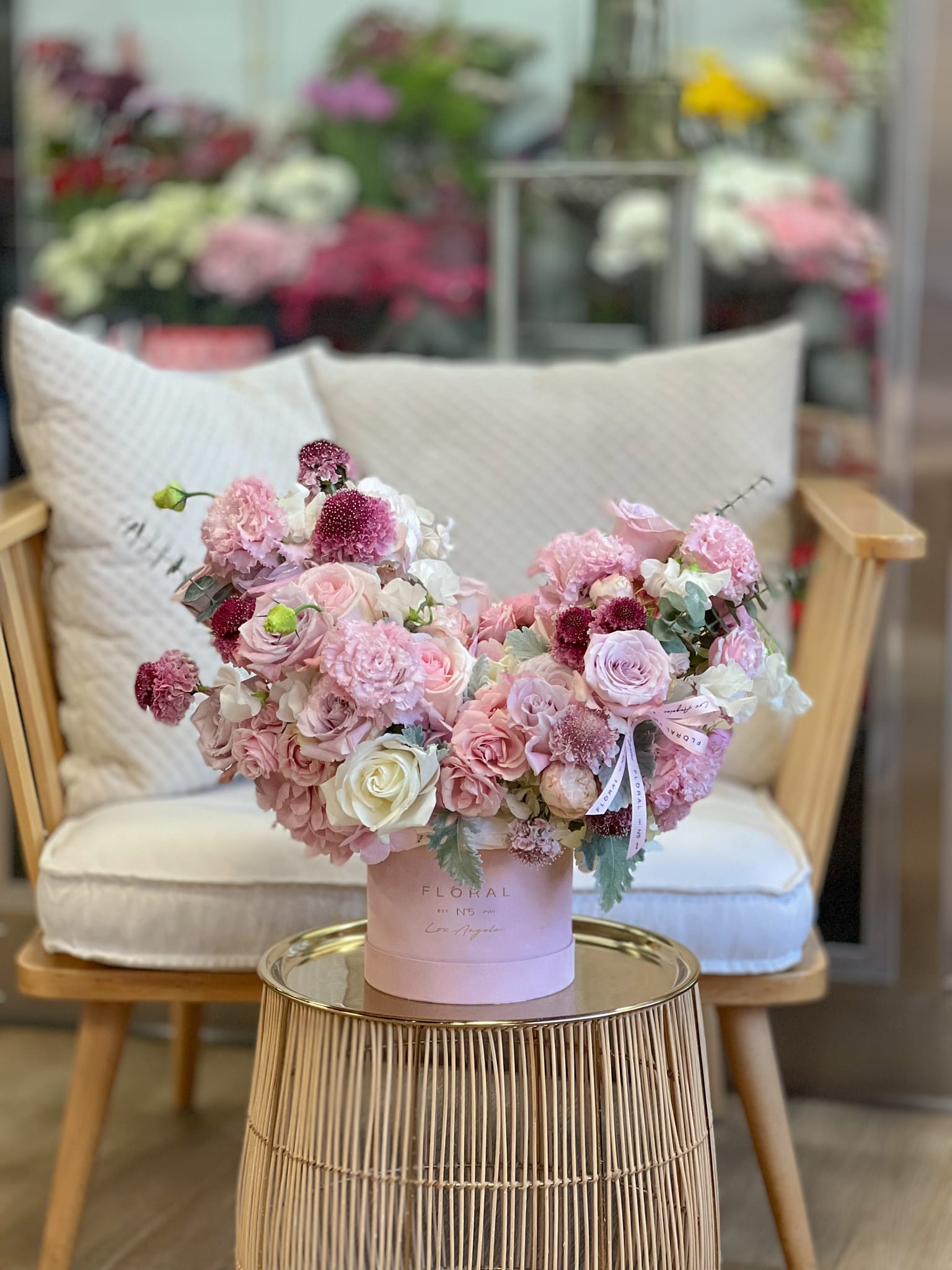 No.704 - Sweetheart - Just fabulous! A pink box filled with Lisianthus, Sweet Eskimo Roses, Scabiosa, Eucalyptus and other flowers to complete the composition.   Available in three sizes and diverse box textures and colors. On the photo: Size-Standard, Box Material - Velvet, Box Color - Pink.