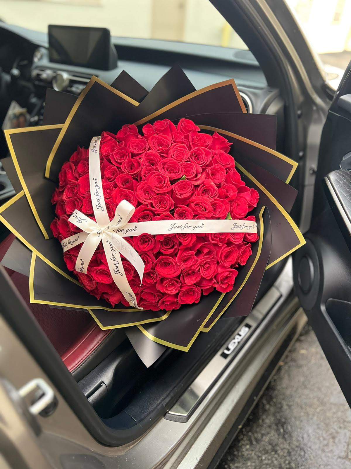 Love Buchon Love Buchon - 100 Red Roses Wrapped Back Paper and Ribbon Just for You.
