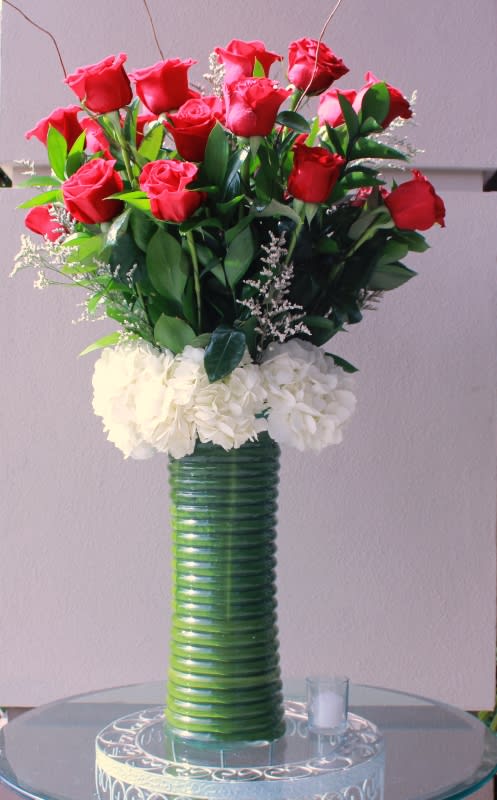 2 dz. long Stem Red Roses - 2 dz. long stem red roses arranged with white hydrangeas and filler.